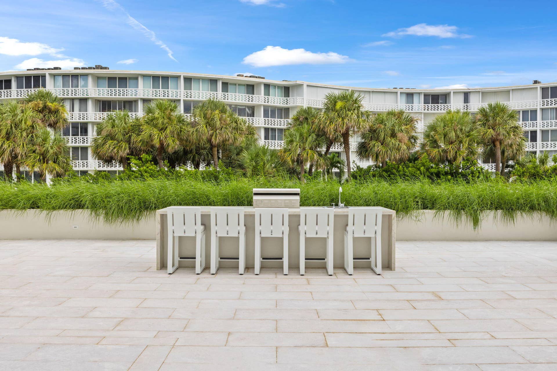 2773 S Ocean Boulevard, #517, Palm Beach, Palm Beach, FL 33480 Outdoor patio featuring a built-in bar with seating for six, integrated grill, and paver flooring