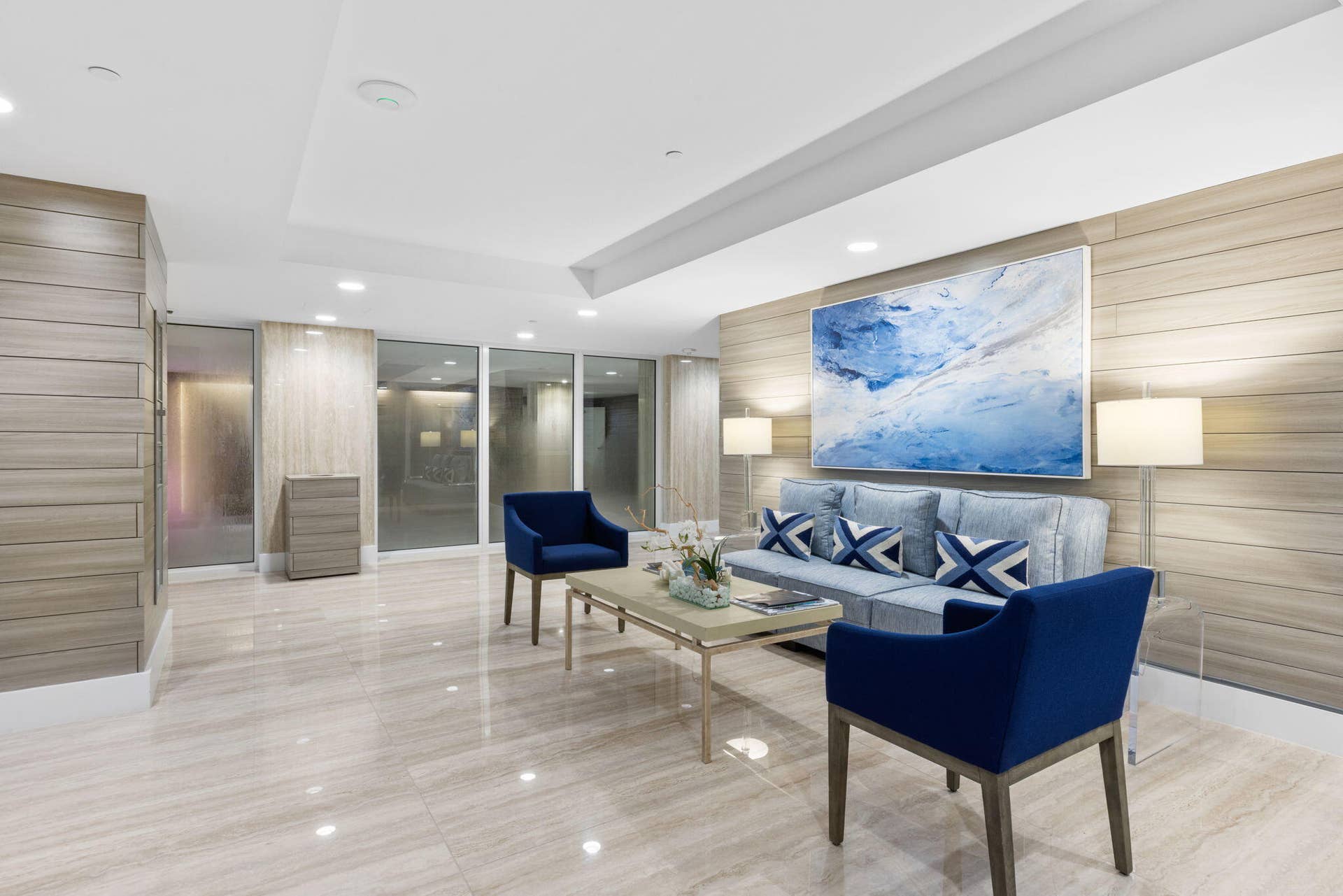 2773 S Ocean Boulevard, #517, Palm Beach, Palm Beach, FL 33480 Polished stone flooring, recessed lighting, floor-to-ceiling windows, and wood-finish accent walls define this space