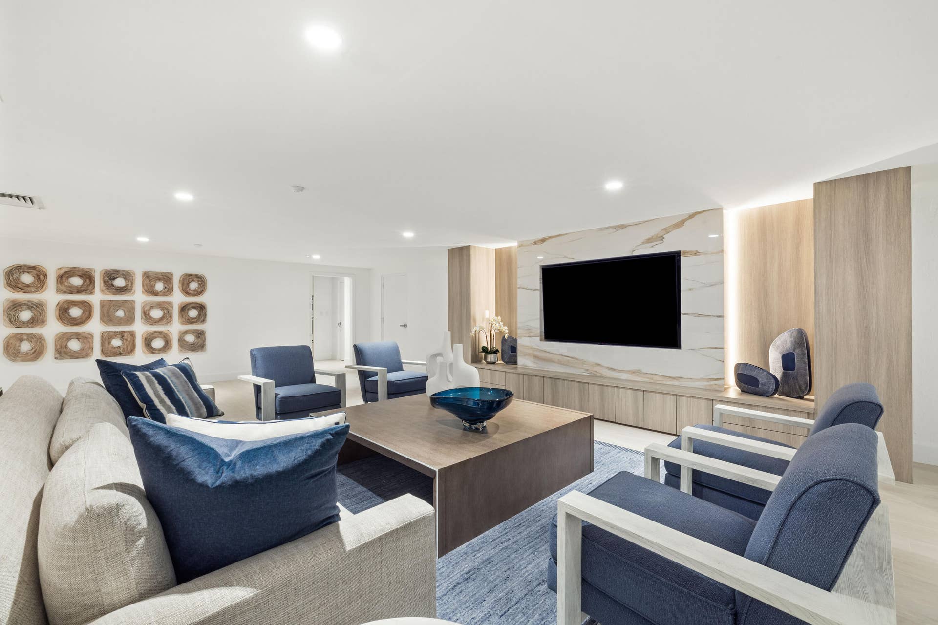 2773 S Ocean Boulevard, #517, Palm Beach, Palm Beach, FL 33480 Built-in media center with a marble-finish accent wall