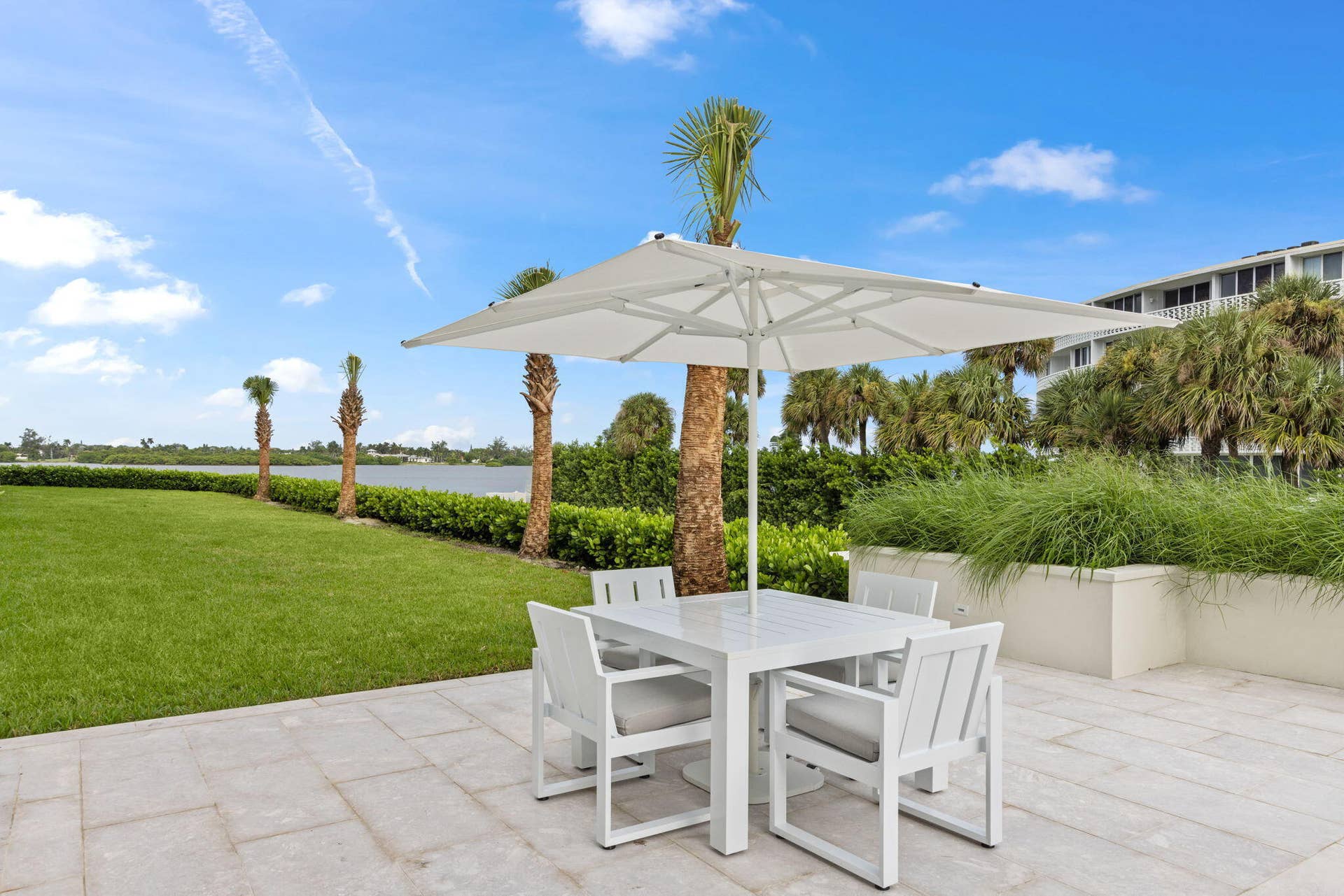 2773 S Ocean Boulevard, #517, Palm Beach, Palm Beach, FL 33480 Expansive patio featuring a square umbrella and a rectangular table