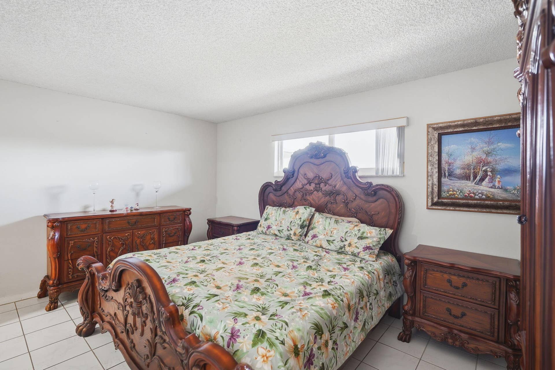 2606 Garden Drive S, #305, Lake Worth, FL 33461 Primary bedroom with beautiful, sturdy solid carved wood furniture