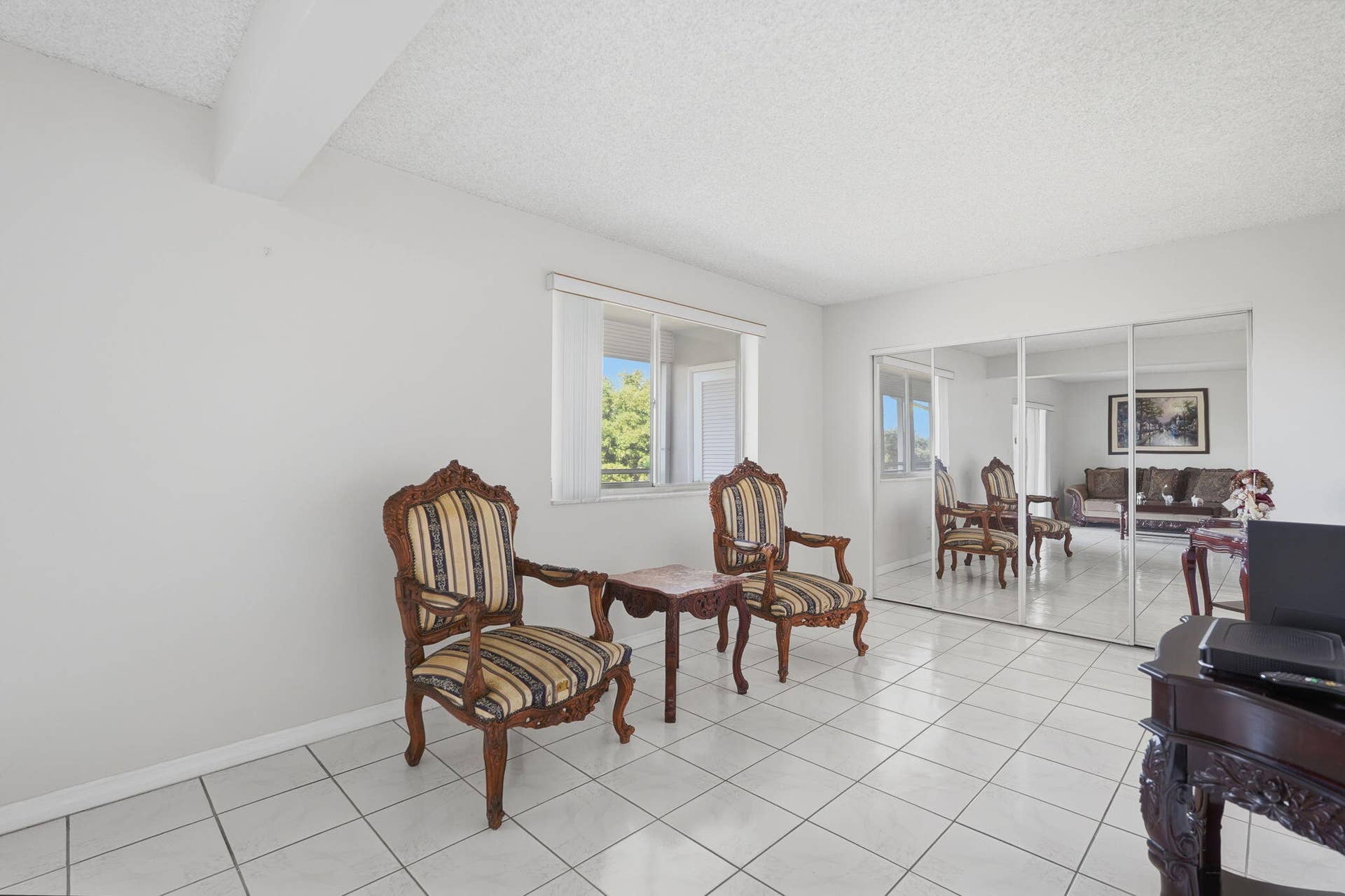 2606 Garden Drive S, #305, Lake Worth, FL 33461 Second bedroom/den - note closet at the back with full length mirror doors