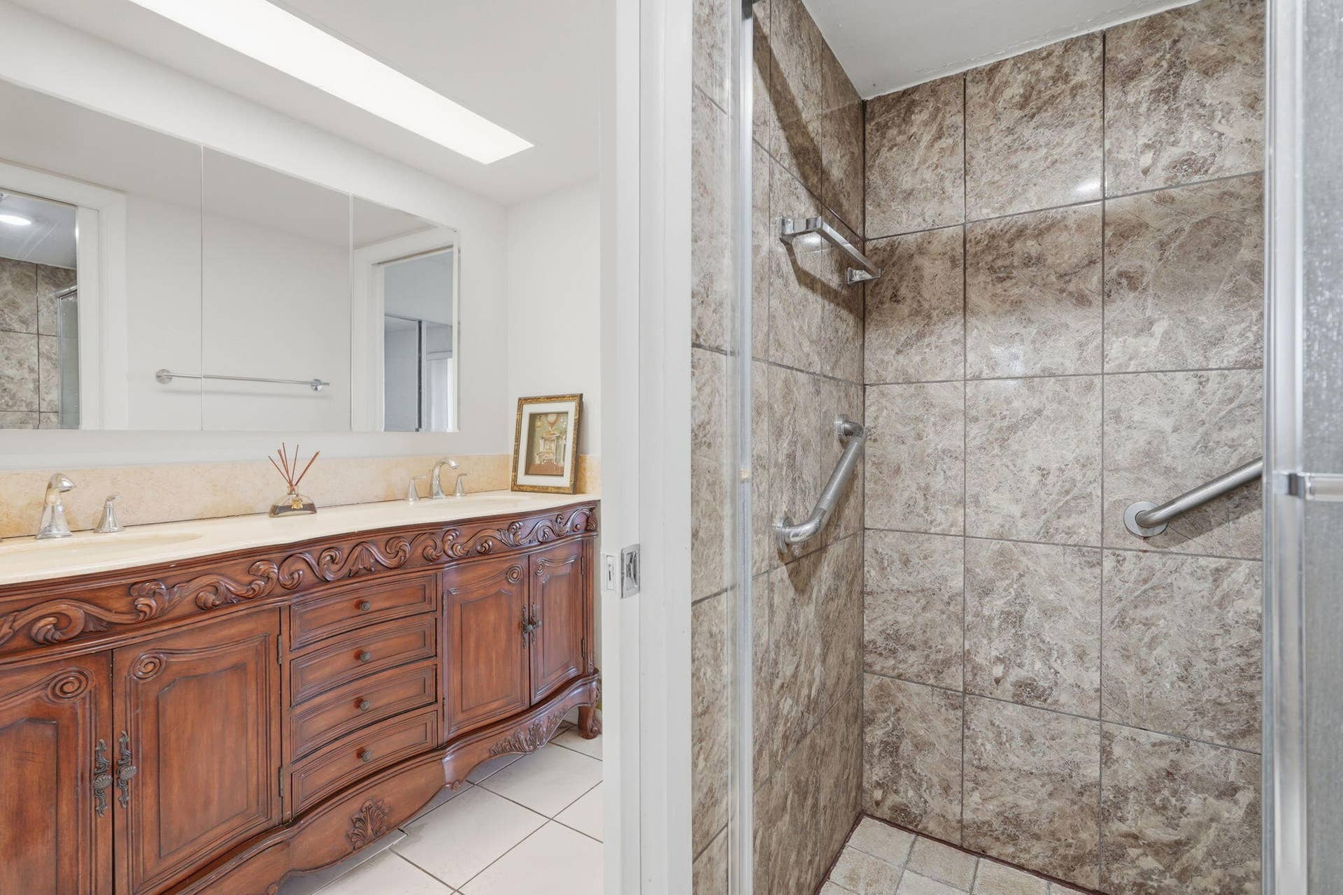 2606 Garden Drive S, #305, Lake Worth, FL 33461 Bathroom with updated and upgraded shower and vanity