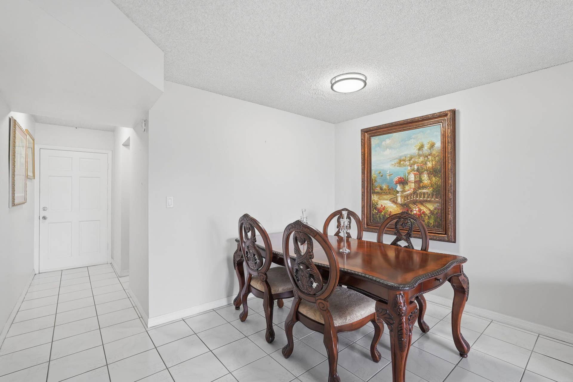 2606 Garden Drive S, #305, Lake Worth, FL 33461 Dining room and entry foyer (kitchen is behind that wall)