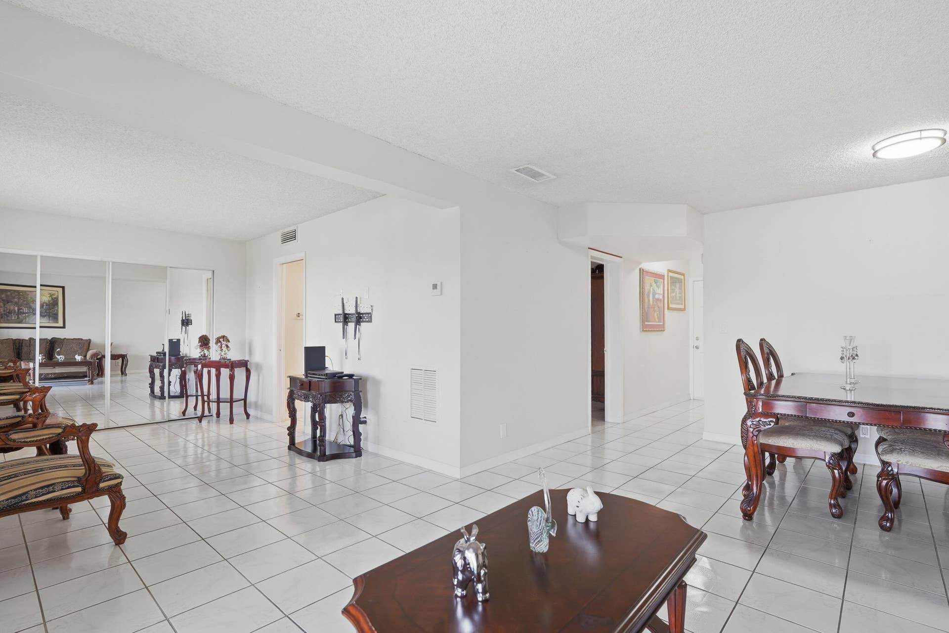 2606 Garden Drive S, #305, Lake Worth, FL 33461 View of dining room and second bedroom/den from living room