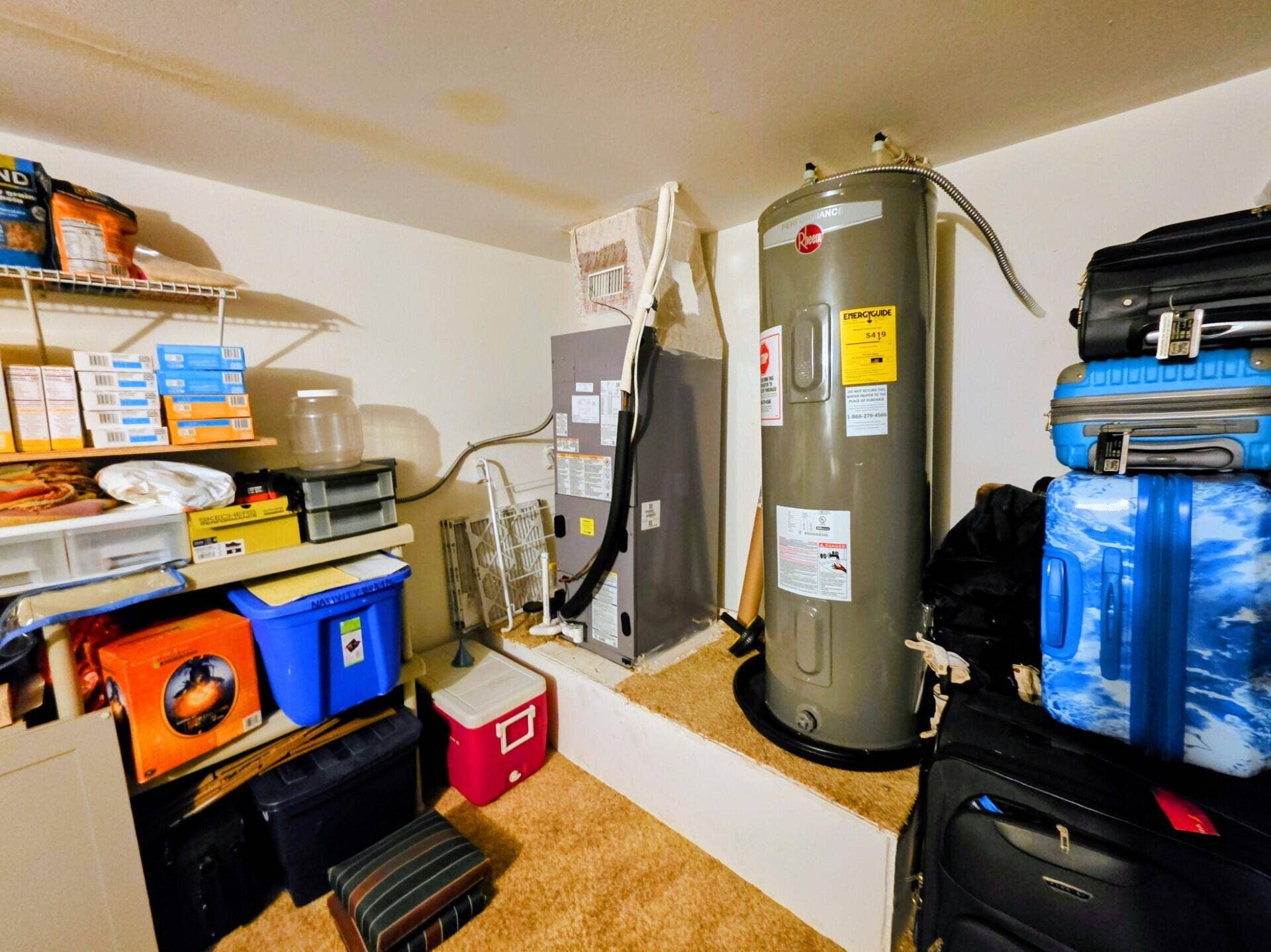 Photo shows Water Heater & Air Handler
