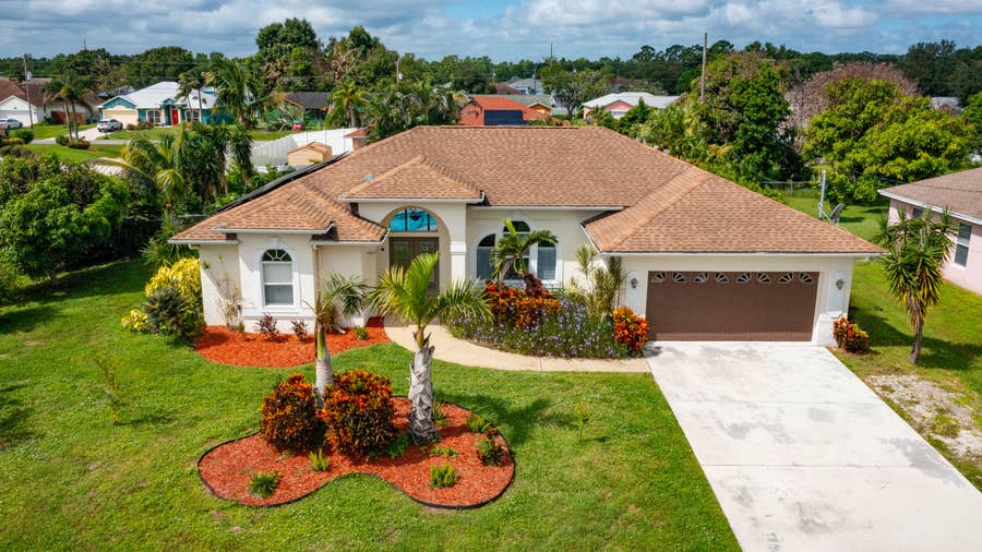 Property photo for 3210 SE OTIS Lane, Port St Lucie, FL