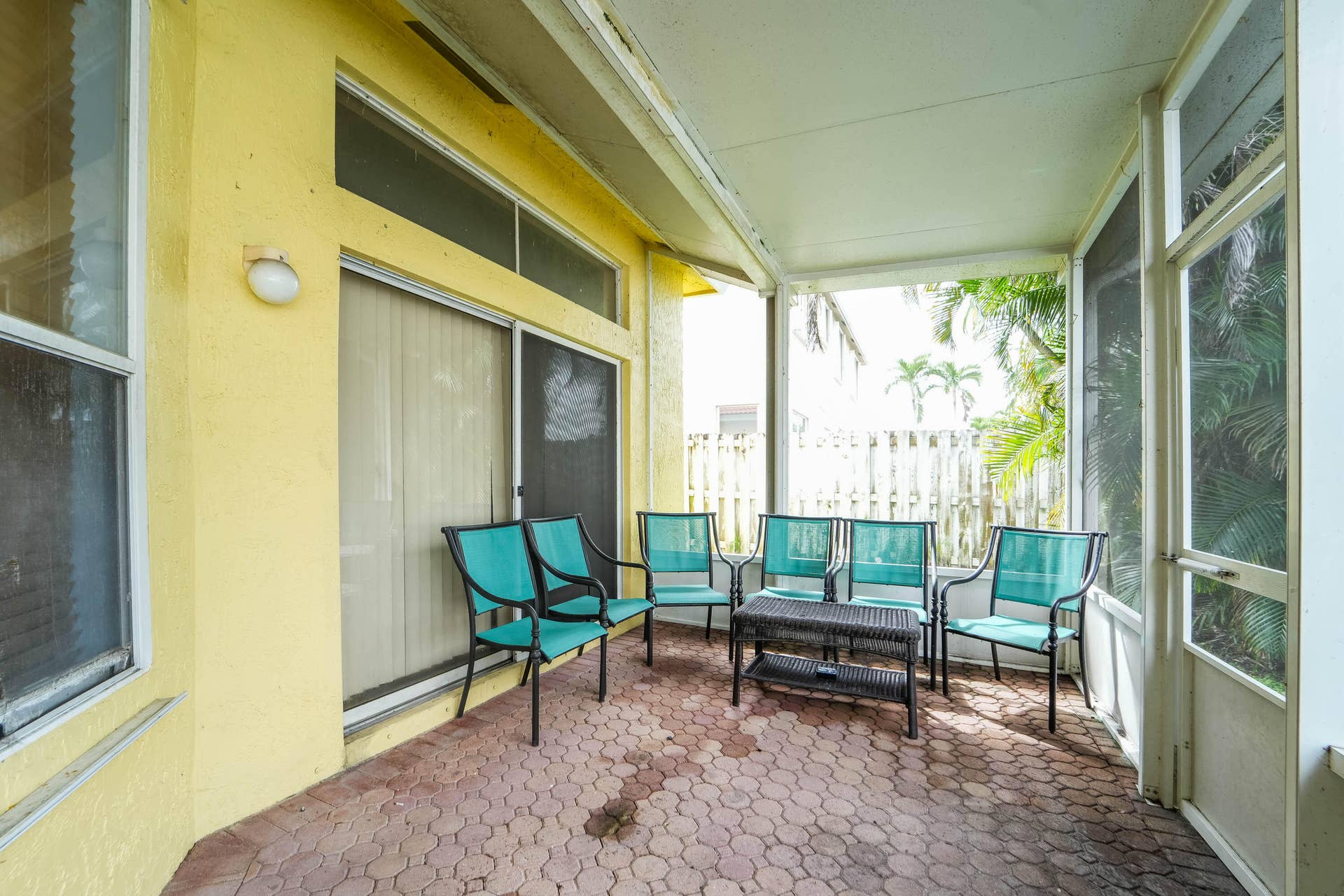 6801 Las Colinas Lane, Lake Worth, FL 33463 sliding glass doors lead to yard from living room or family room