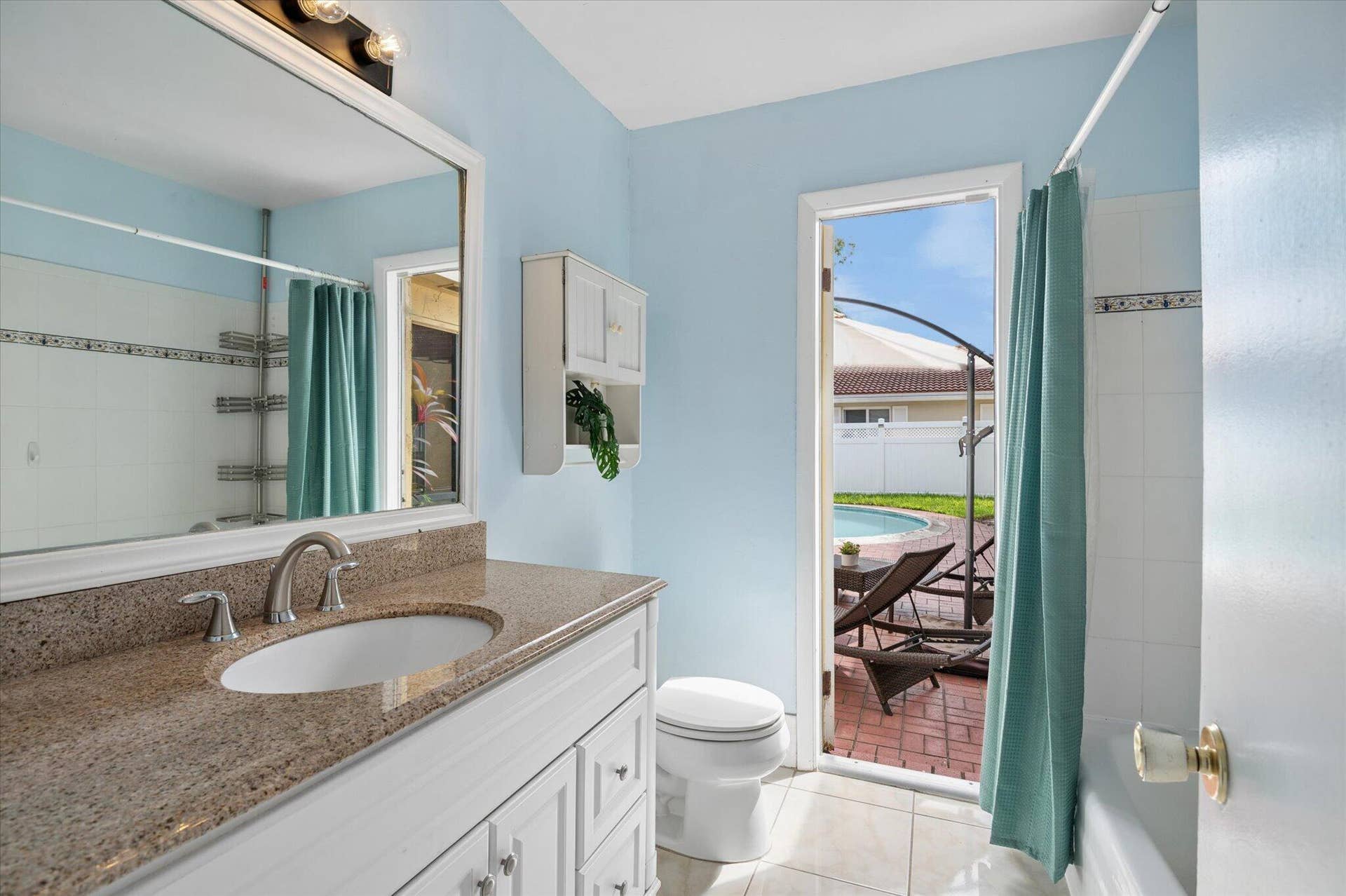 11913 NW 31st Street, Coral Springs, FL 33065 2nd Bathroom has access to outdoor patio, too!