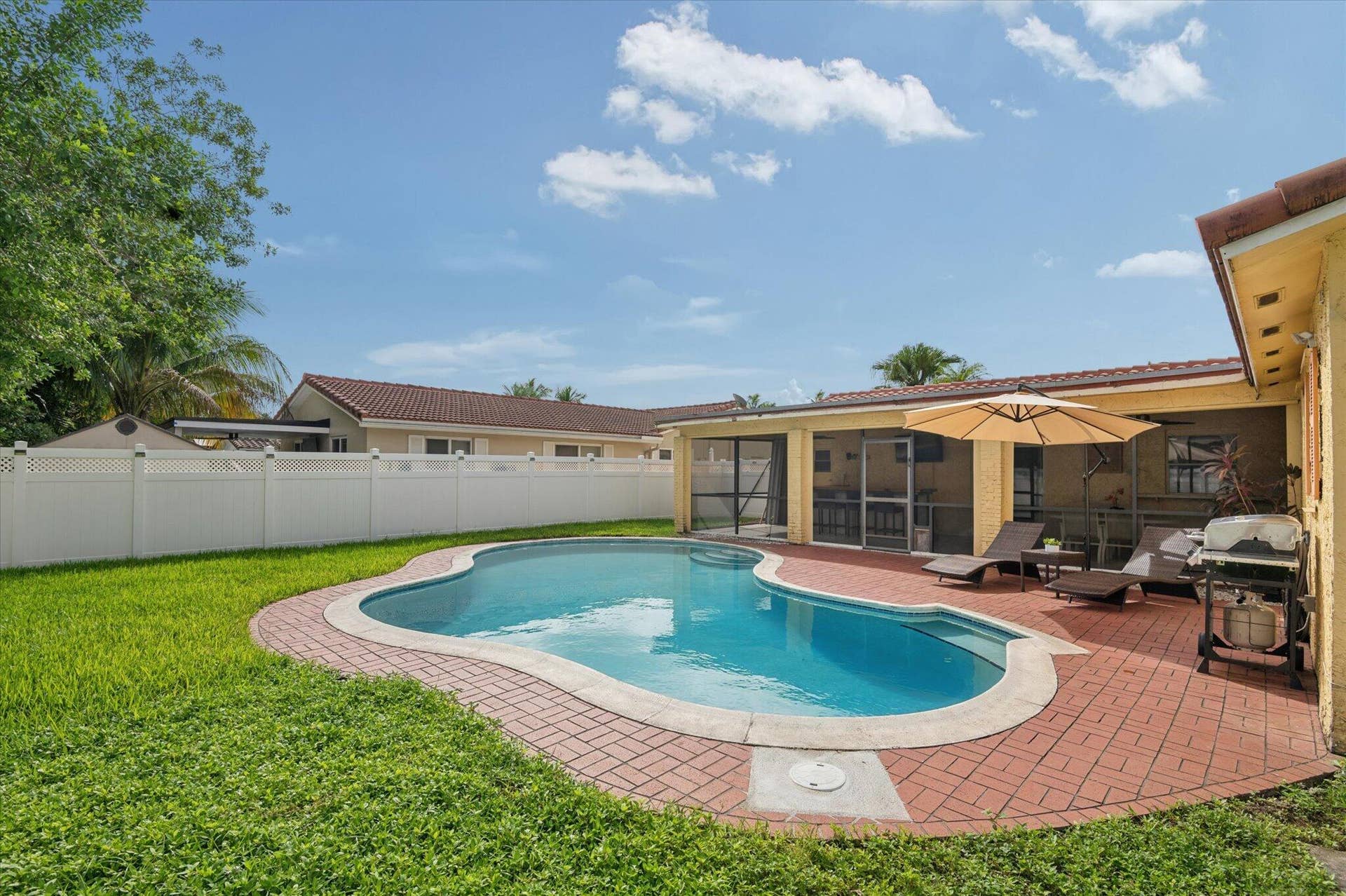 11913 NW 31st Street, Coral Springs, FL 33065 Large Pool and private fenced-in yard (Fence 2022)