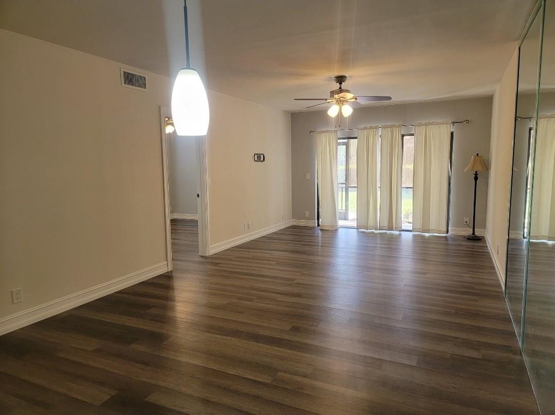 1001 SE 6TH Avenue, #127, Deerfield Beach, Deerfield Beach, FL 33441 Wood-finish flooring throughout, complemented by a ceiling fan with integrated lighting
