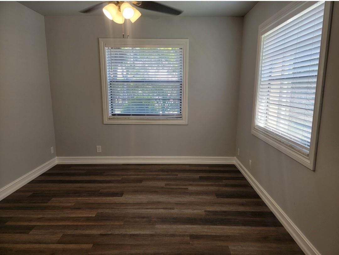 1001 SE 6TH Avenue, #127, Deerfield Beach, Deerfield Beach, FL 33441 Wood-finish flooring, light gray wall paint, and white trim