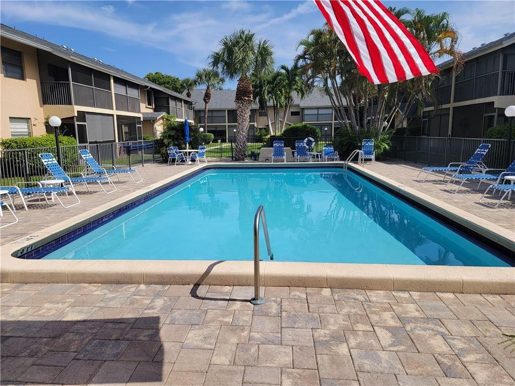 1001 SE 6TH Avenue, #127, Deerfield Beach, Deerfield Beach, FL 33441 Community swimming pool with paver decking and surrounding privacy fencing