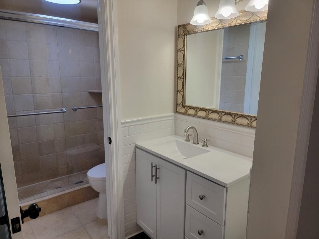 1001 SE 6TH Avenue, #127, Deerfield Beach, Deerfield Beach, FL 33441 White shaker vanity with brushed nickel hardware, integrated sink, and white countertop