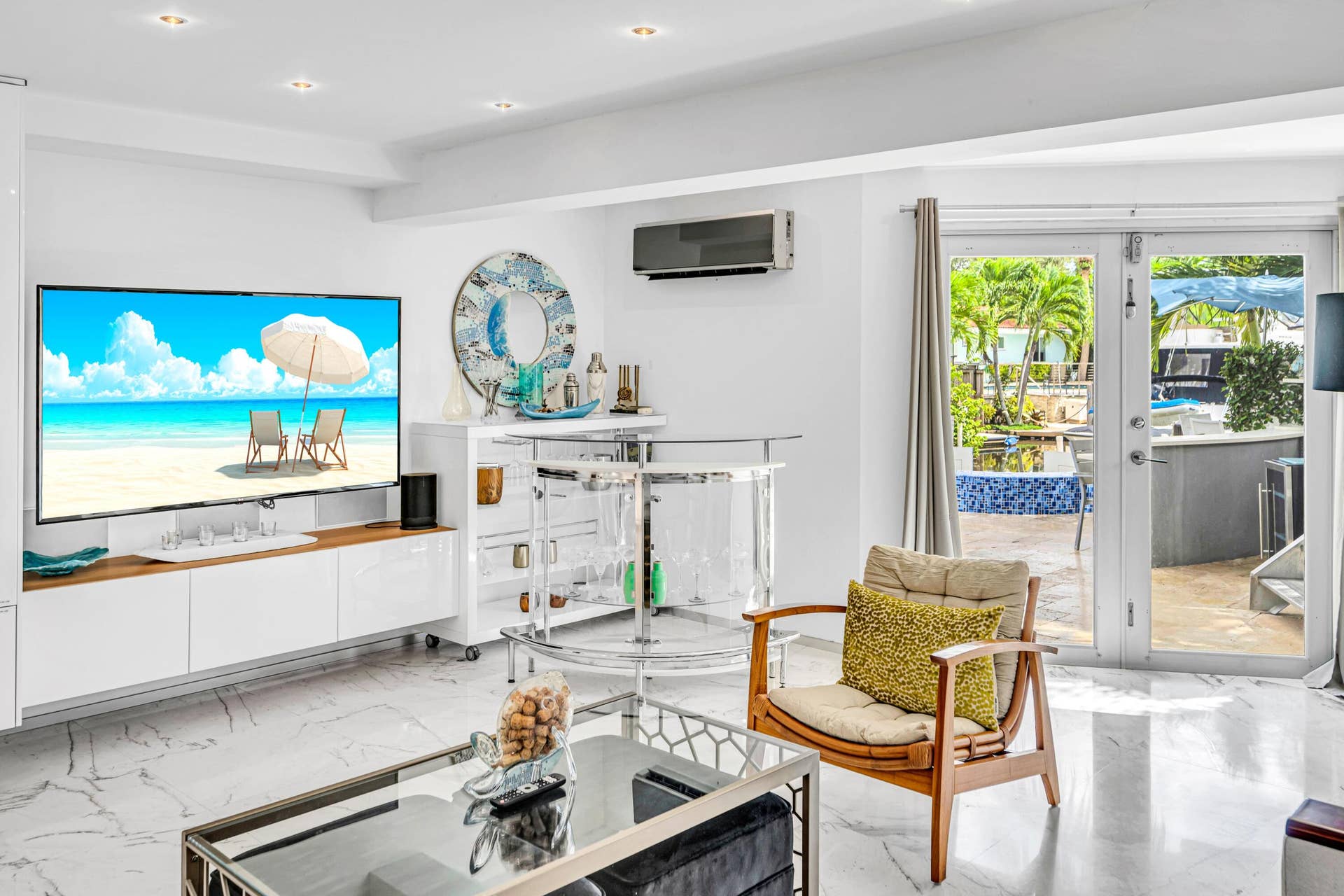 510 SW 18th Avenue, Fort Lauderdale, FL 33312 Recessed lighting, sleek white cabinetry, and large format marble-look flooring