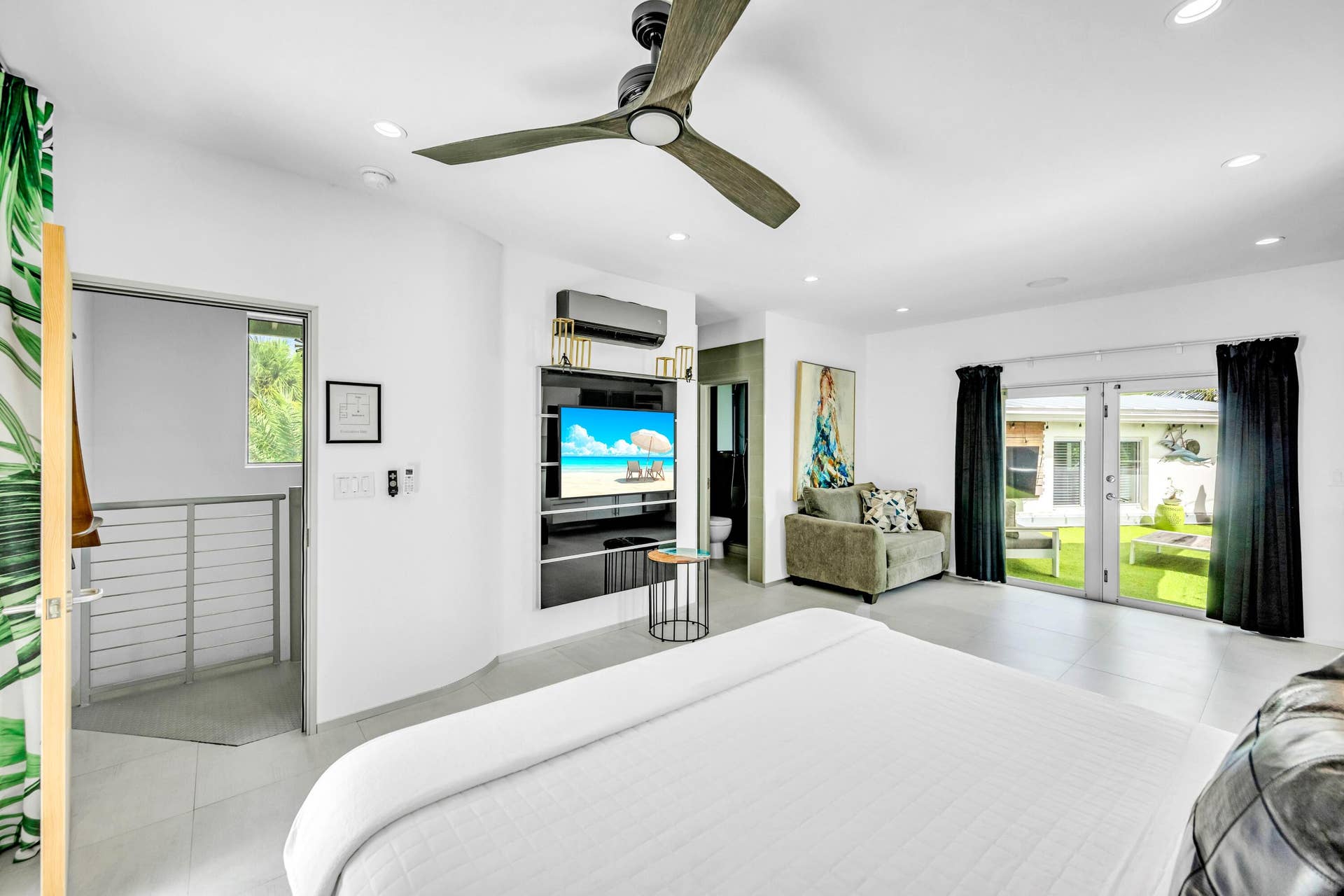 510 SW 18th Avenue, Fort Lauderdale, FL 33312 Recessed lighting, ceiling fan, built-in media console, sliding glass door, and hard surface flooring