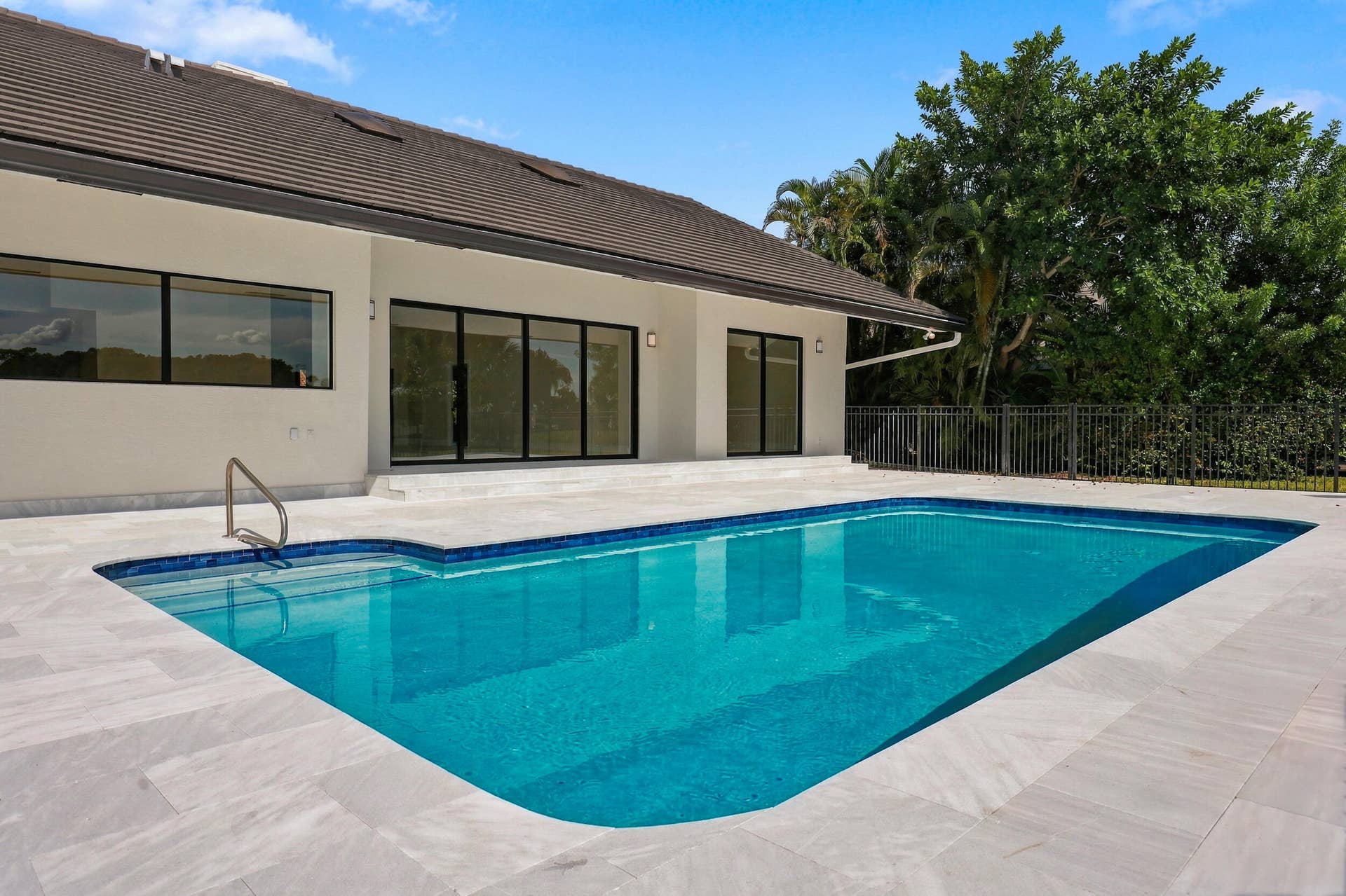 10941 BOCA WOODS Lane, Boca Raton, FL 33428 newly diamond brite and tile. New pool heater.