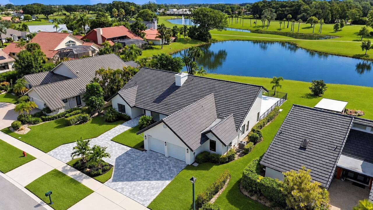 10941 BOCA WOODS Lane, Boca Raton, FL 33428 Majestic lake views, North South exposure