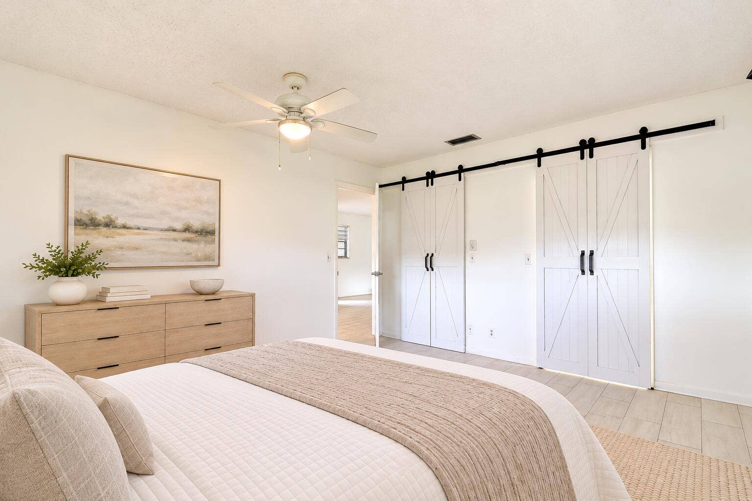 450 BLUEBIRD Lane, Delray Beach, FL 33445 White walls with wood-finish flooring
