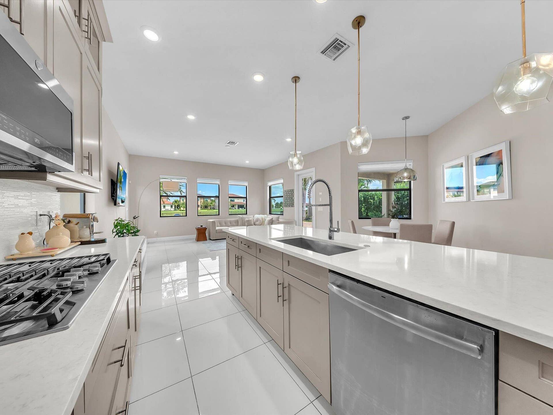 11965 S BAYPOINT Circle, Parkland, FL 33076 gas stove and extended kitchen look