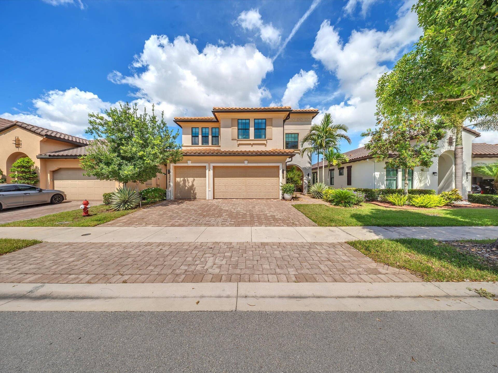 11965 S BAYPOINT Circle, Parkland, FL 33076 3 car garage home parkland bay