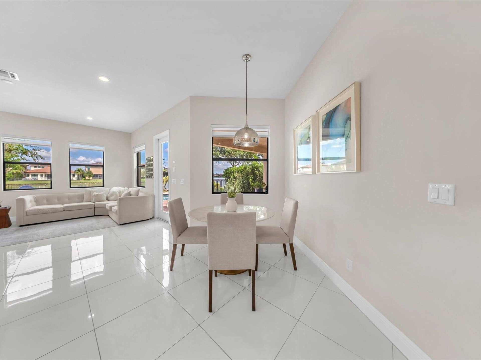 11965 S BAYPOINT Circle, Parkland, FL 33076 breakfast table and family room