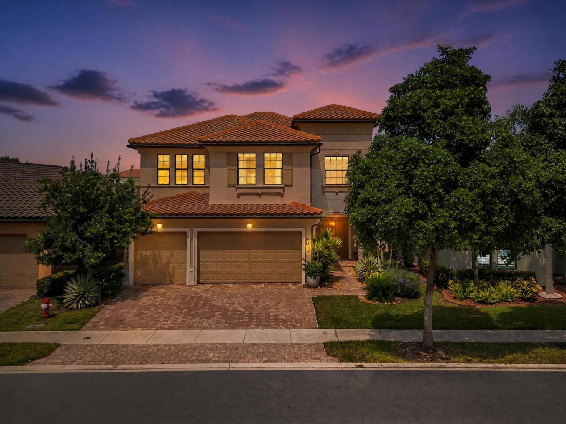 11965 S BAYPOINT Circle, Parkland, FL 33076 Home at Night Parkland Bay