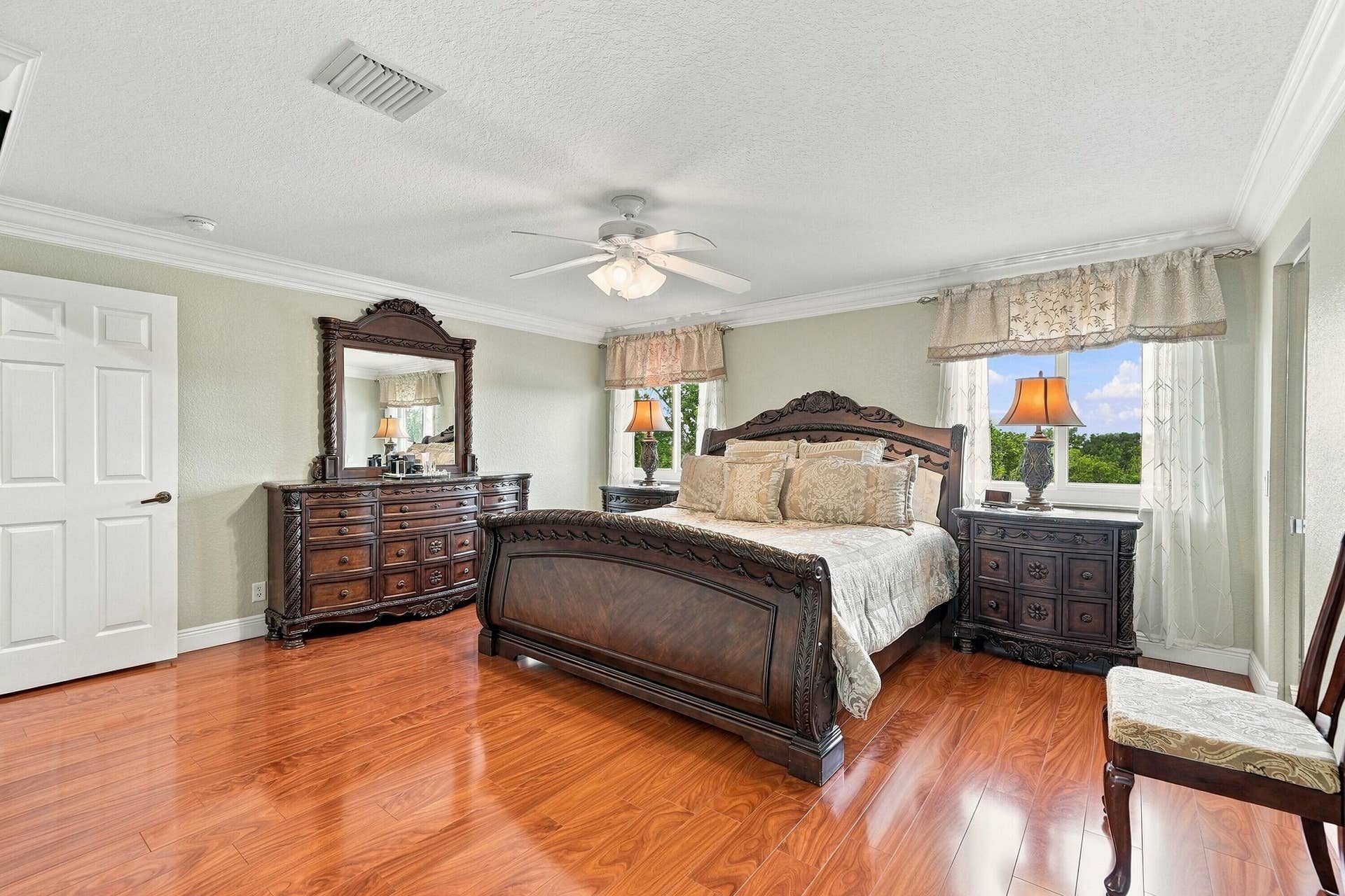 1020 Lavender Circle, Weston, FL 33327 Recessed lighting, wood-finish flooring, and crown molding