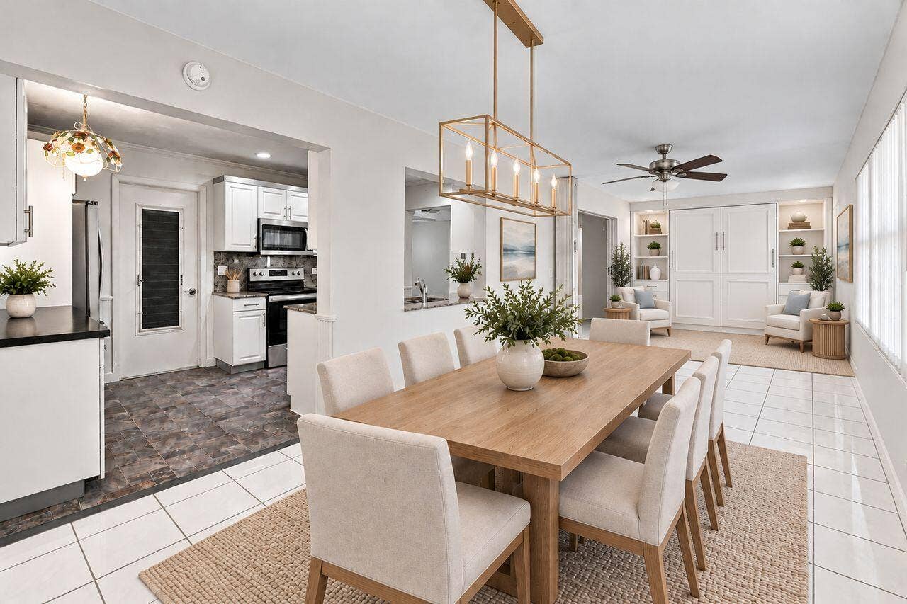 1003 SW 17th Street, Boynton Beach, FL 33426 Large living space with a custom Murphy Bed/cabinets Bookshelves can serve as a private guest room. (Virtually staged)