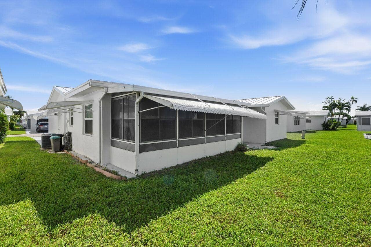 1003 SW 17th Street, Boynton Beach, FL 33426 Enclosed patio for extra relaxation and/or storage for bikes, grill, etc.