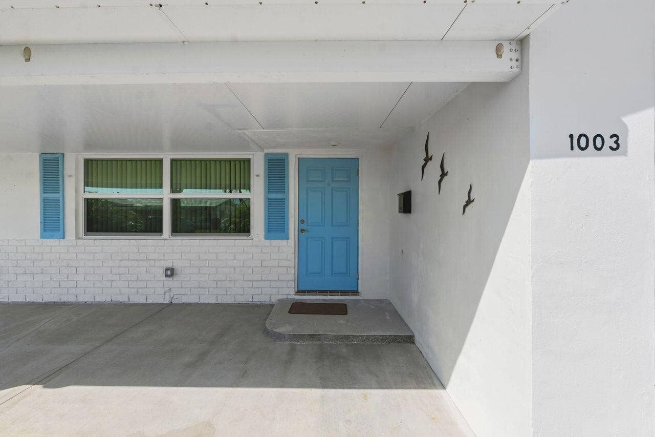 1003 SW 17th Street, Boynton Beach, FL 33426 Covered entryway with concrete flooring
