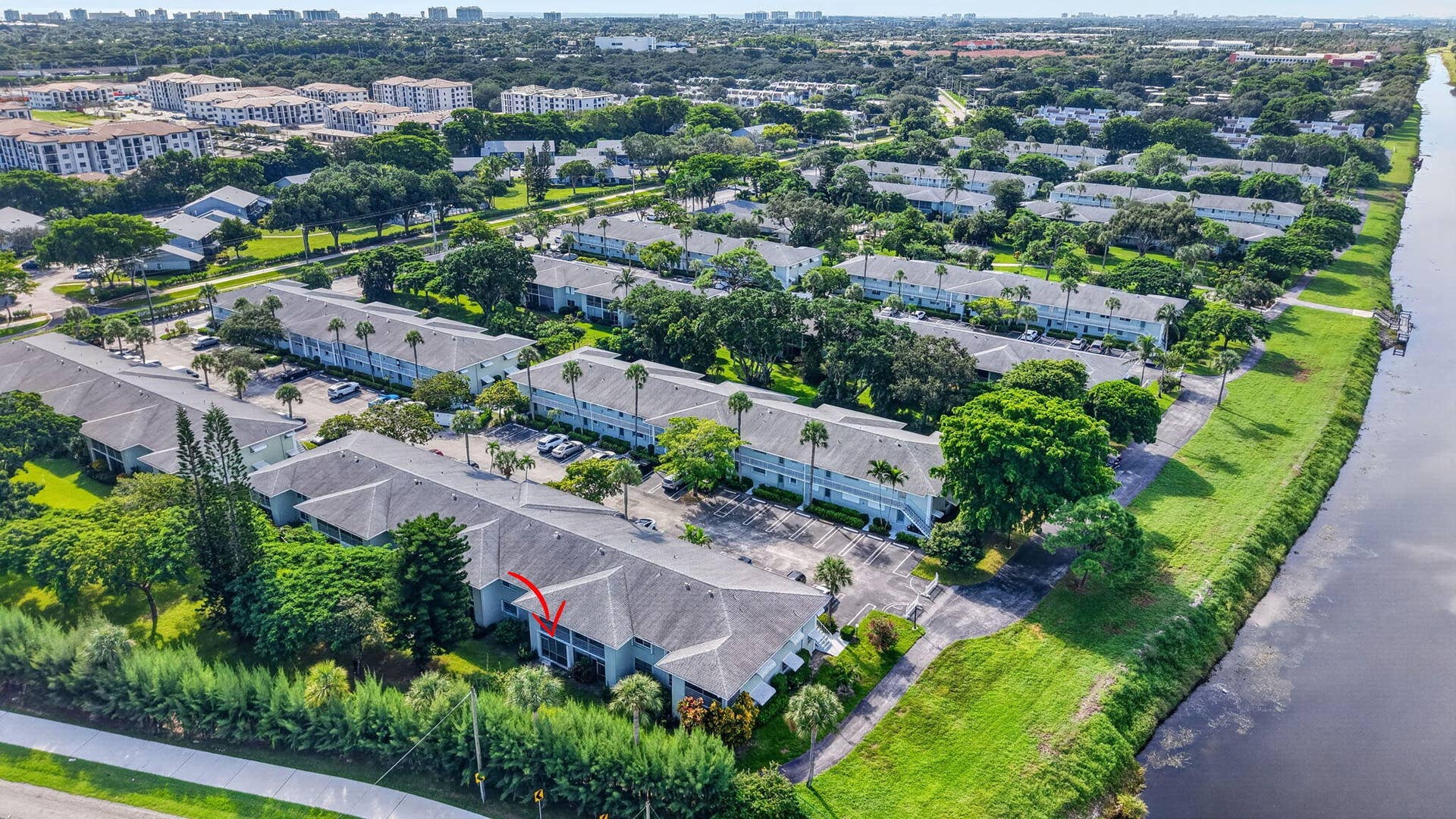 2320 SW 22nd Avenue, #211, Delray Beach, FL 33445 Canal views and lush landscaping