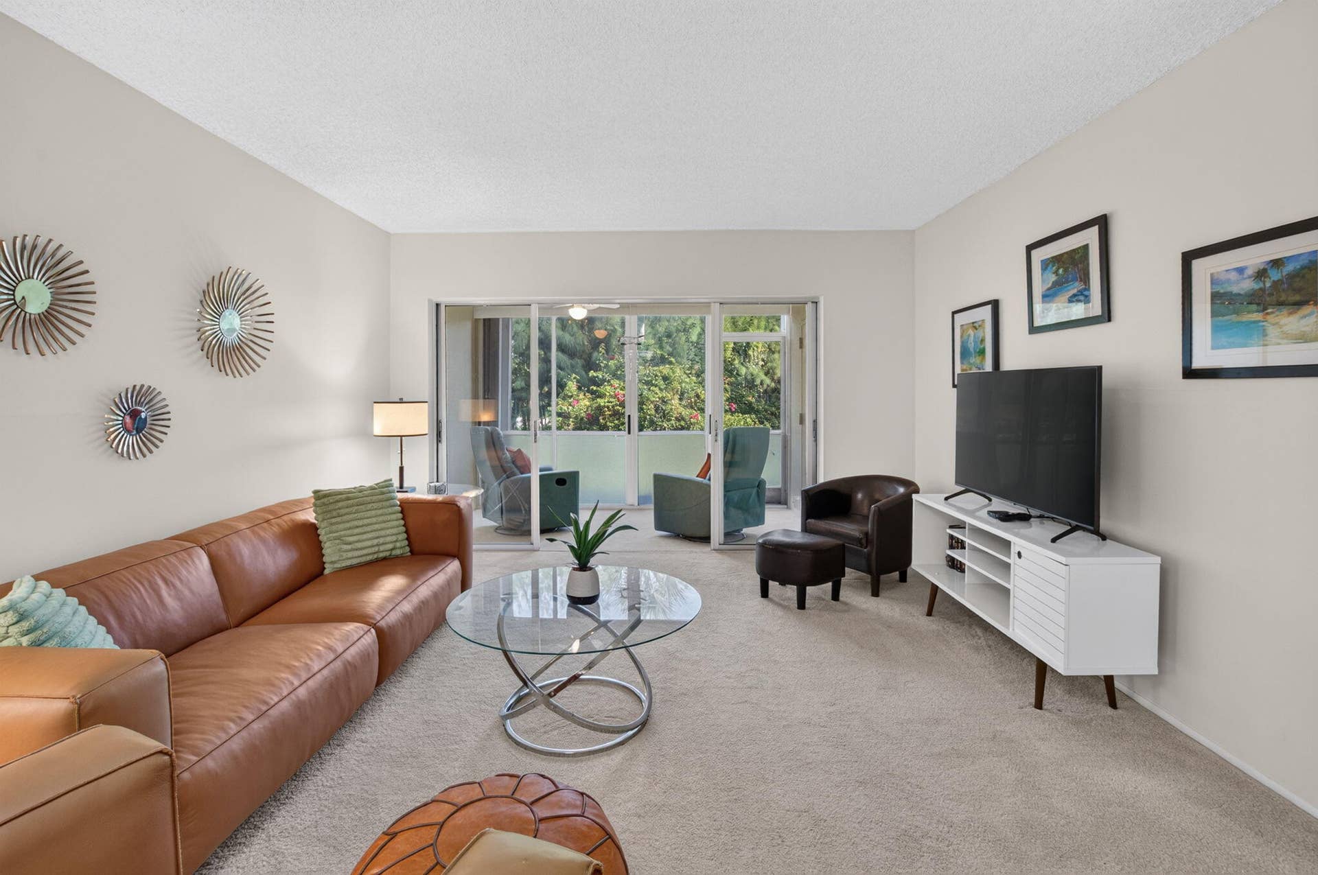 2320 SW 22nd Avenue, #211, Delray Beach, FL 33445 Neutral-toned walls complement the carpeted flooring