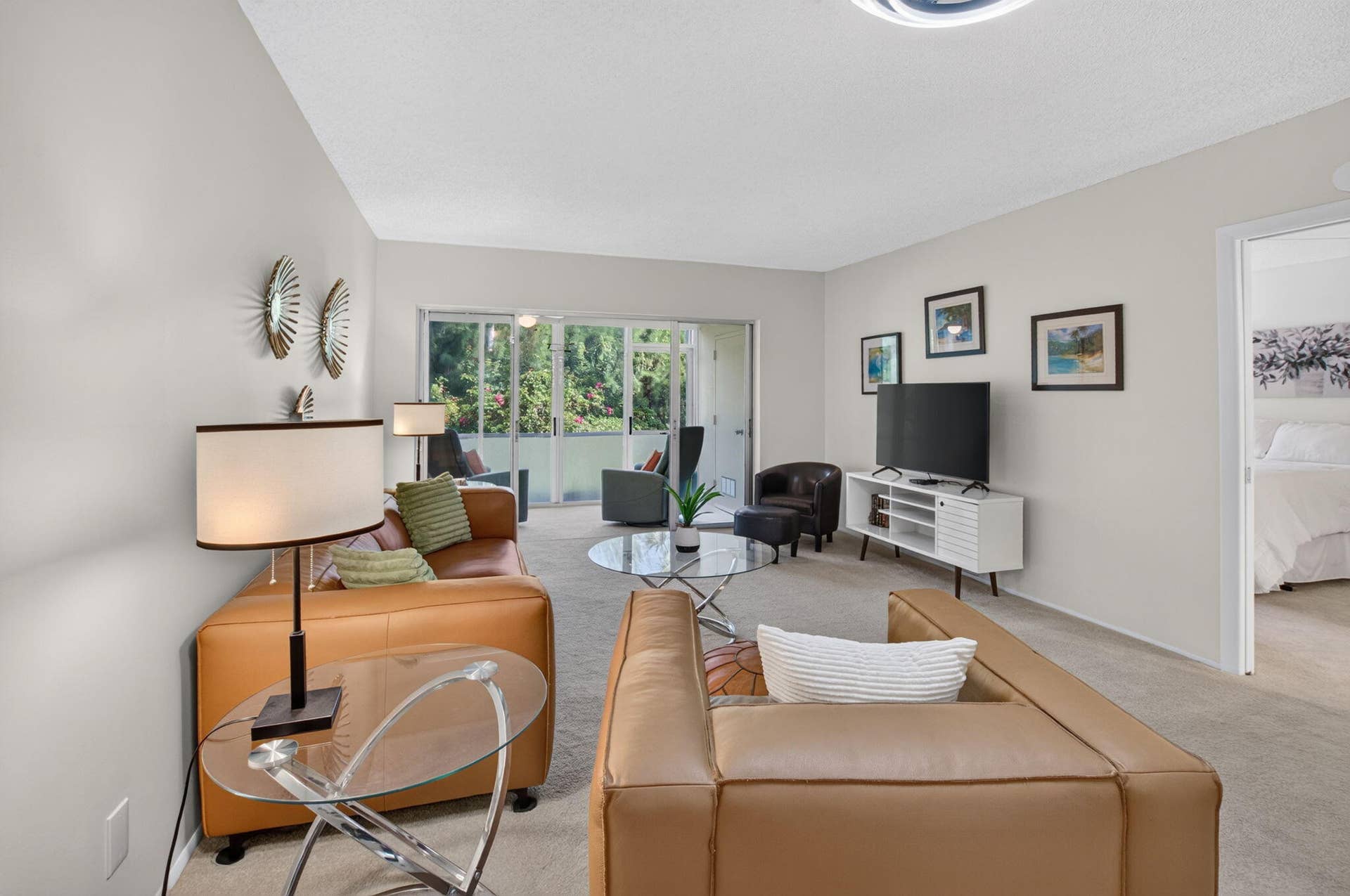 2320 SW 22nd Avenue, #211, Delray Beach, FL 33445 Living area with light-toned wall paint and carpeted flooring