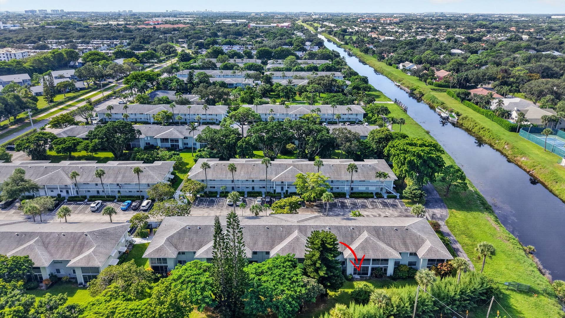2320 SW 22nd Avenue, #211, Delray Beach, FL 33445 Canal views and lush landscaping