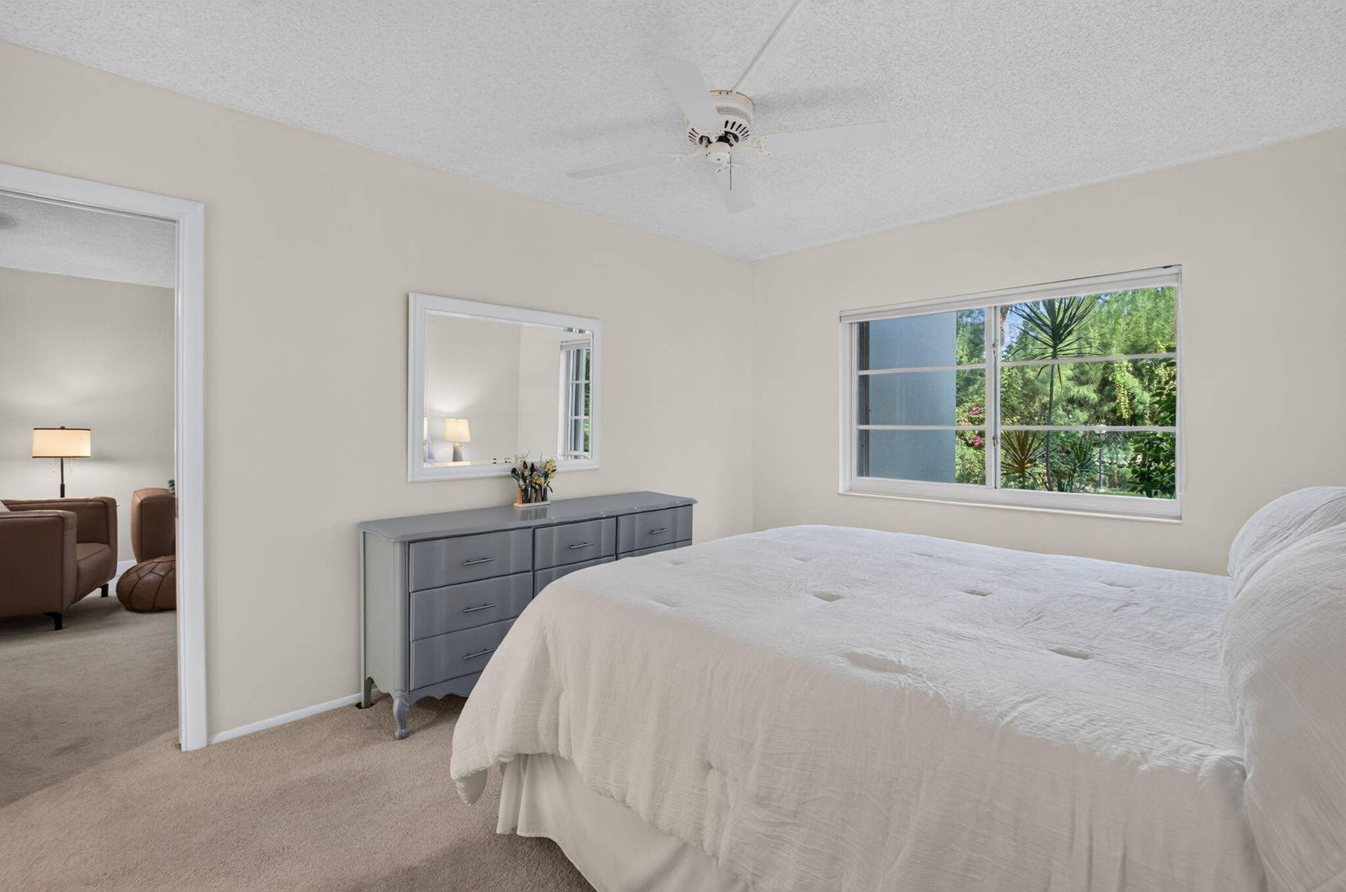 2320 SW 22nd Avenue, #211, Delray Beach, FL 33445 Primary bedroom featuring ensuite bath and walk-in closet.
