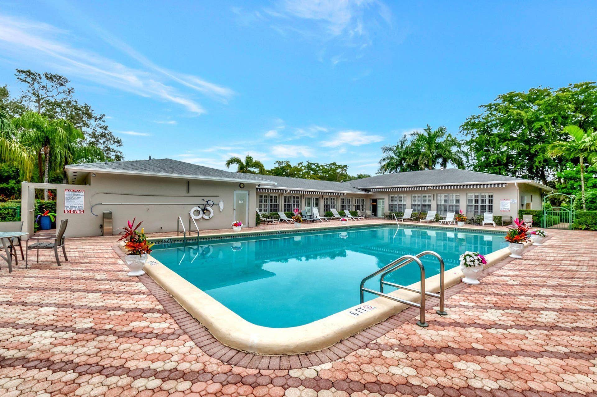 2320 SW 22nd Avenue, #211, Delray Beach, FL 33445 Swimming pool and surrounding paver patio