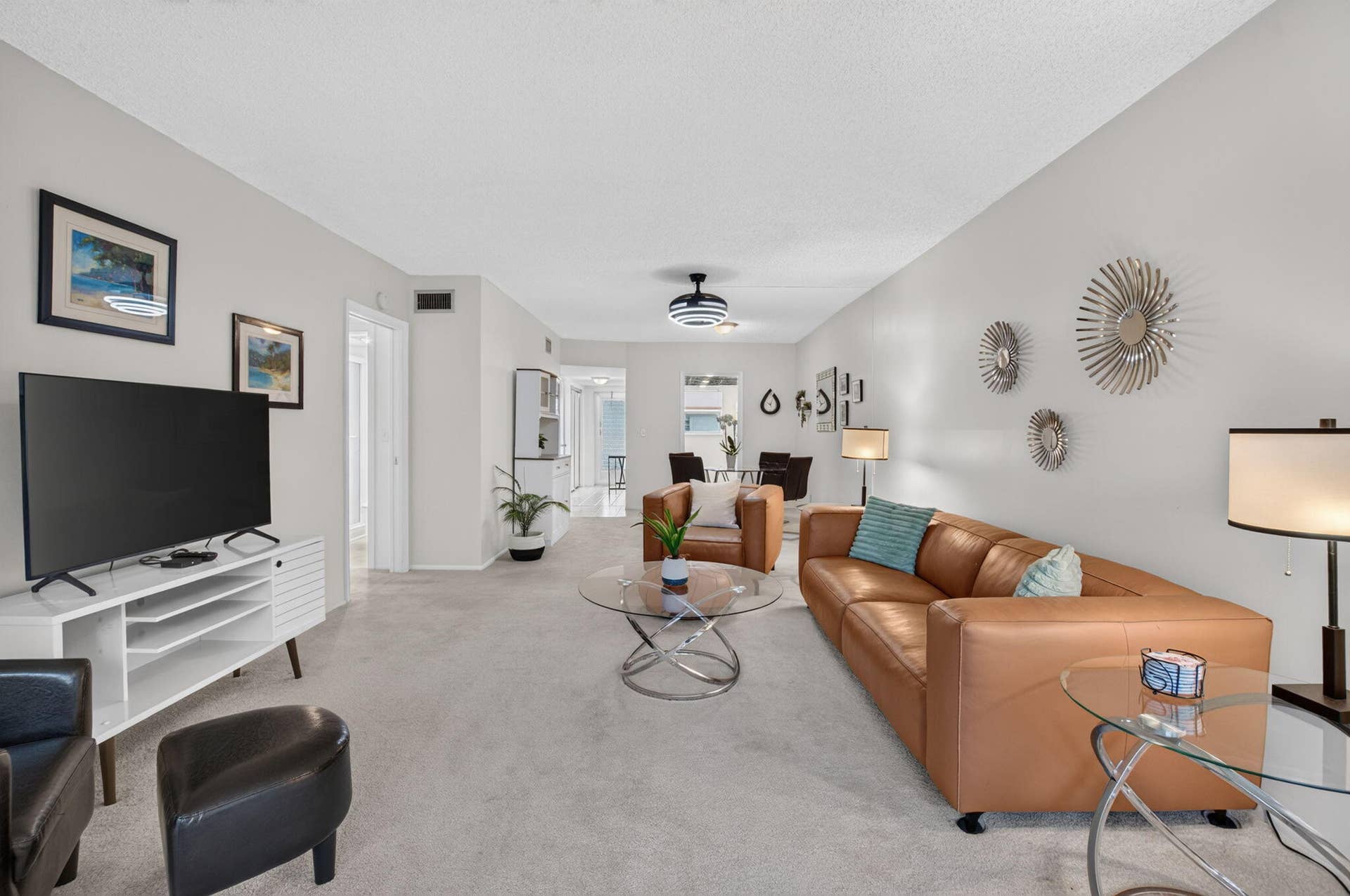 2320 SW 22nd Avenue, #211, Delray Beach, FL 33445 Light-toned carpeting, and neutral-toned walls