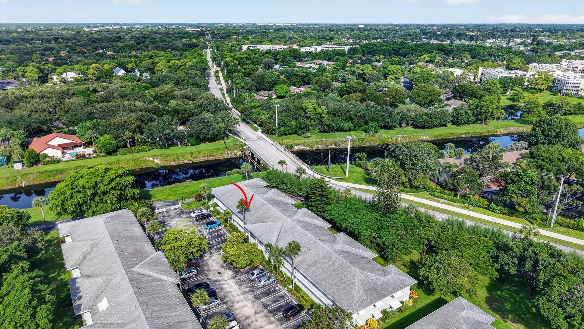 2320 SW 22nd Avenue, #211, Delray Beach, FL 33445 Canal views and mature landscaping