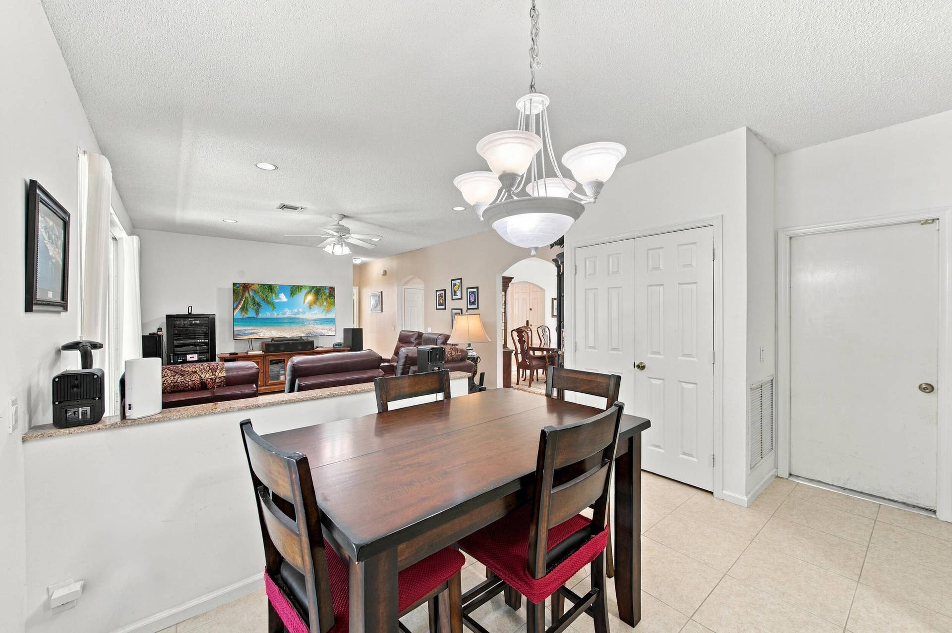 1985 Landing Way, Weston, FL 33326 Tiled flooring, overhead chandelier, recessed lighting, and a ceiling fan