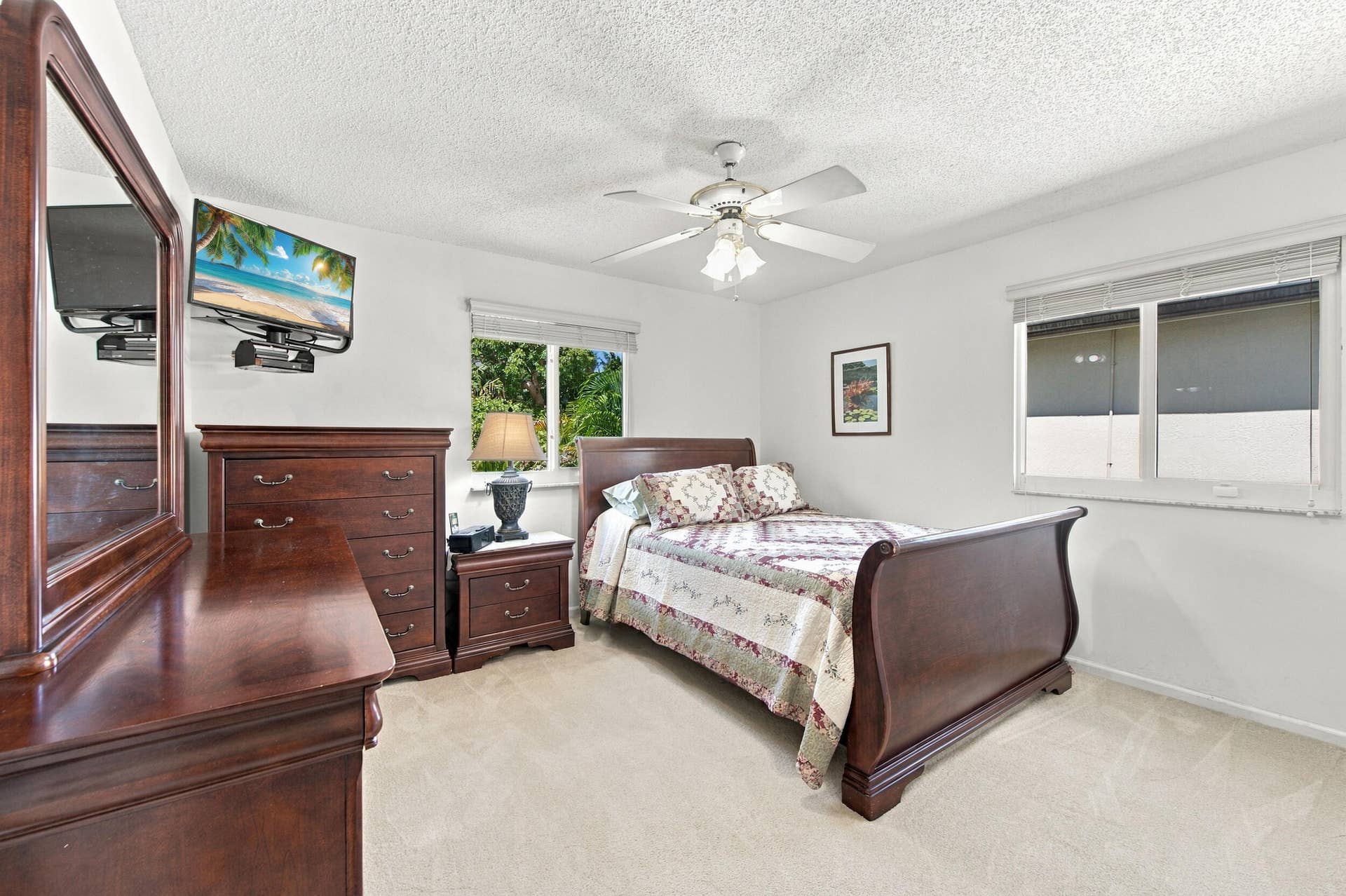 1985 Landing Way, Weston, FL 33326 Recessed windows with blinds, carpeted flooring, and a ceiling fan with integrated lighting