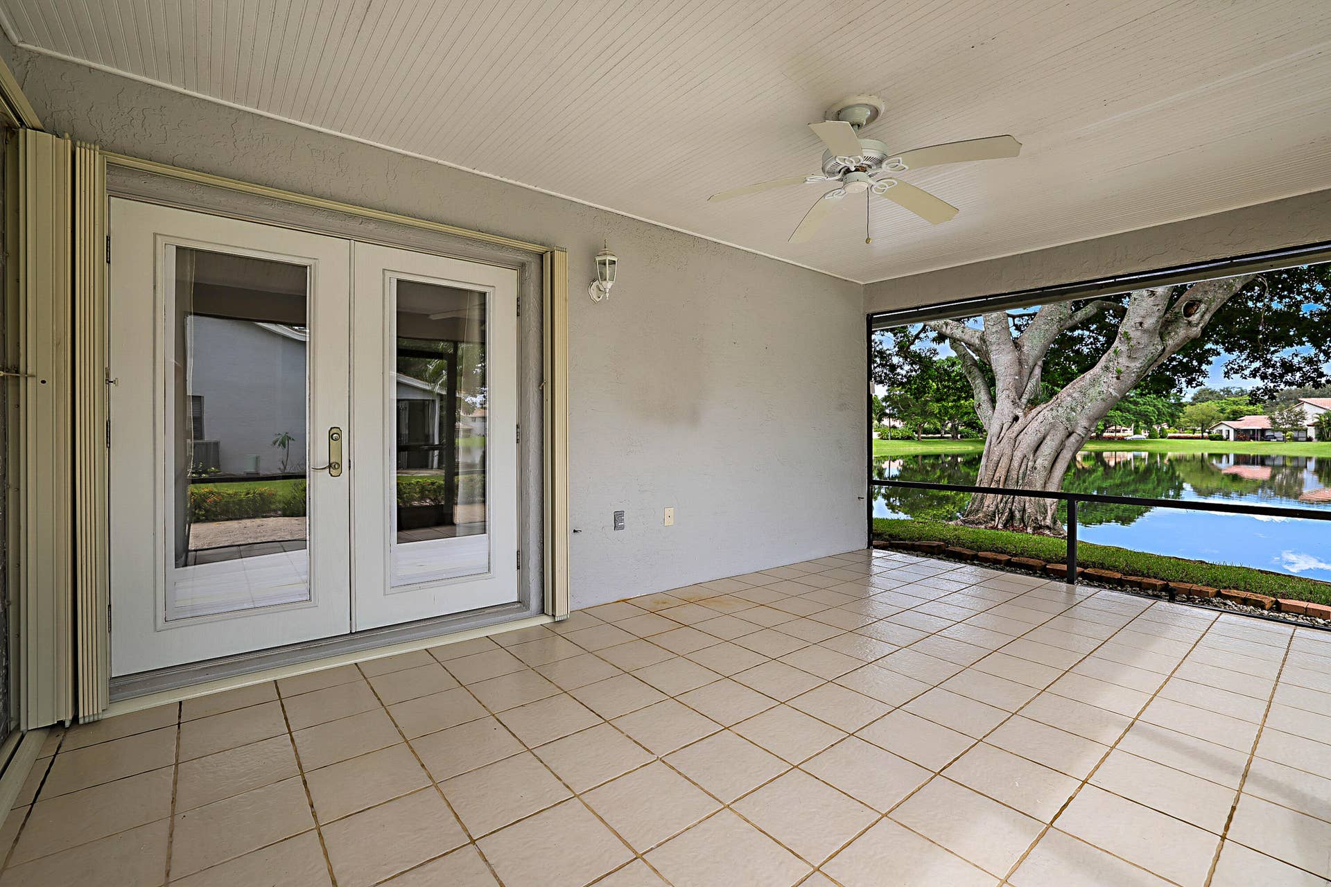 702 DEER CREEK NORTH SHORE Drive, Deerfield Beach, FL 33442 Screened Porch