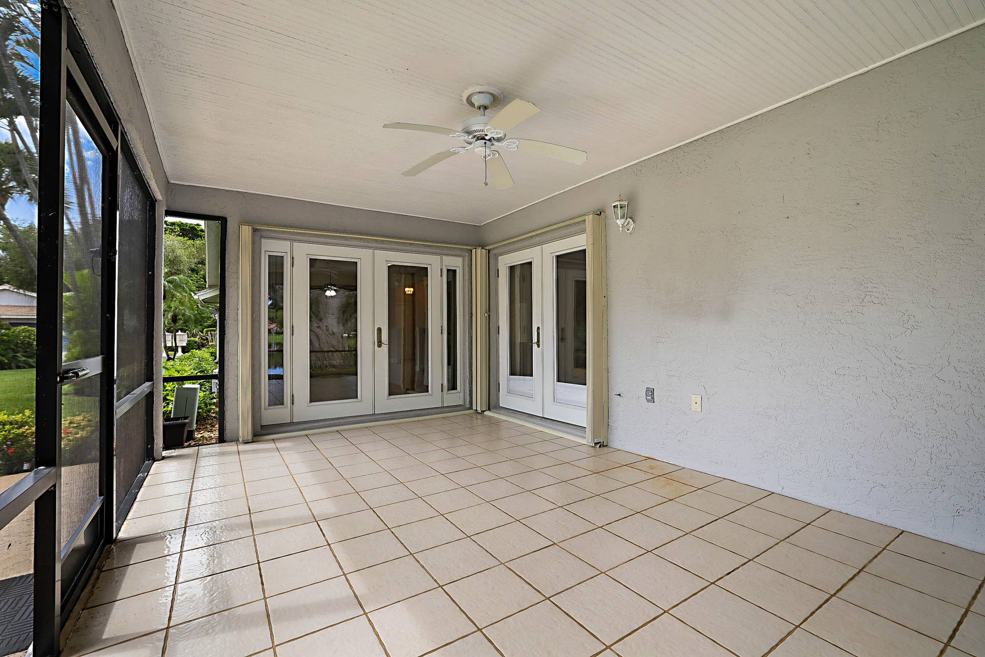 702 DEER CREEK NORTH SHORE Drive, Deerfield Beach, FL 33442 Screened Porch