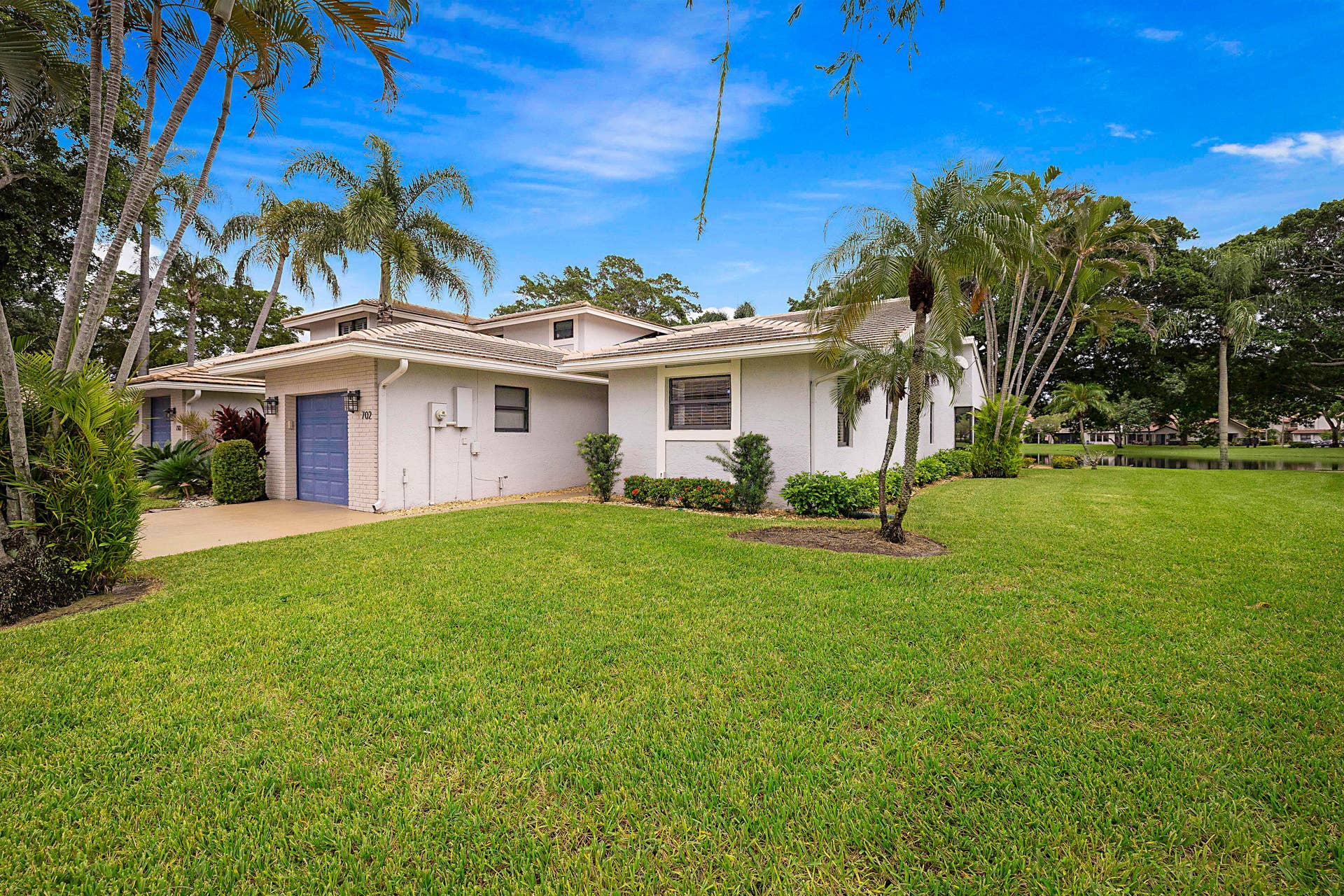 702 DEER CREEK NORTH SHORE Drive, Deerfield Beach, FL 33442 Side Yard