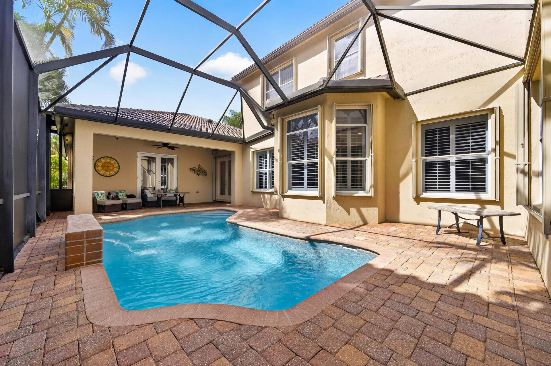 122 SANTIAGO Drive, Jupiter, FL 33458 Patio Pool View