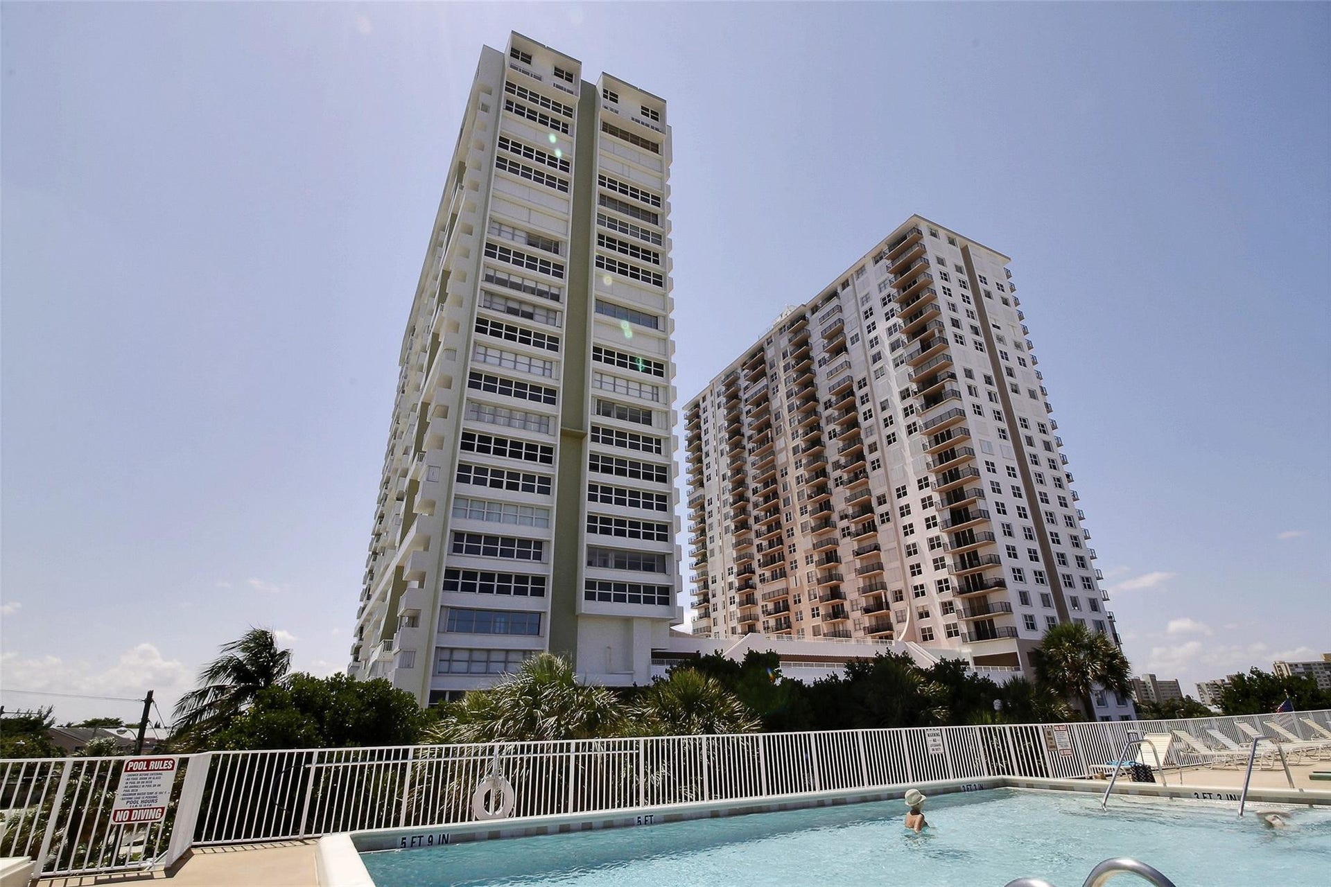 101 Briny Avenue, #1107, Pompano Beach, FL 33062 Building exterior and south pool