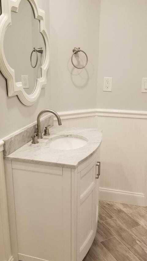 Tastefully updated bathroom with storage in vanity