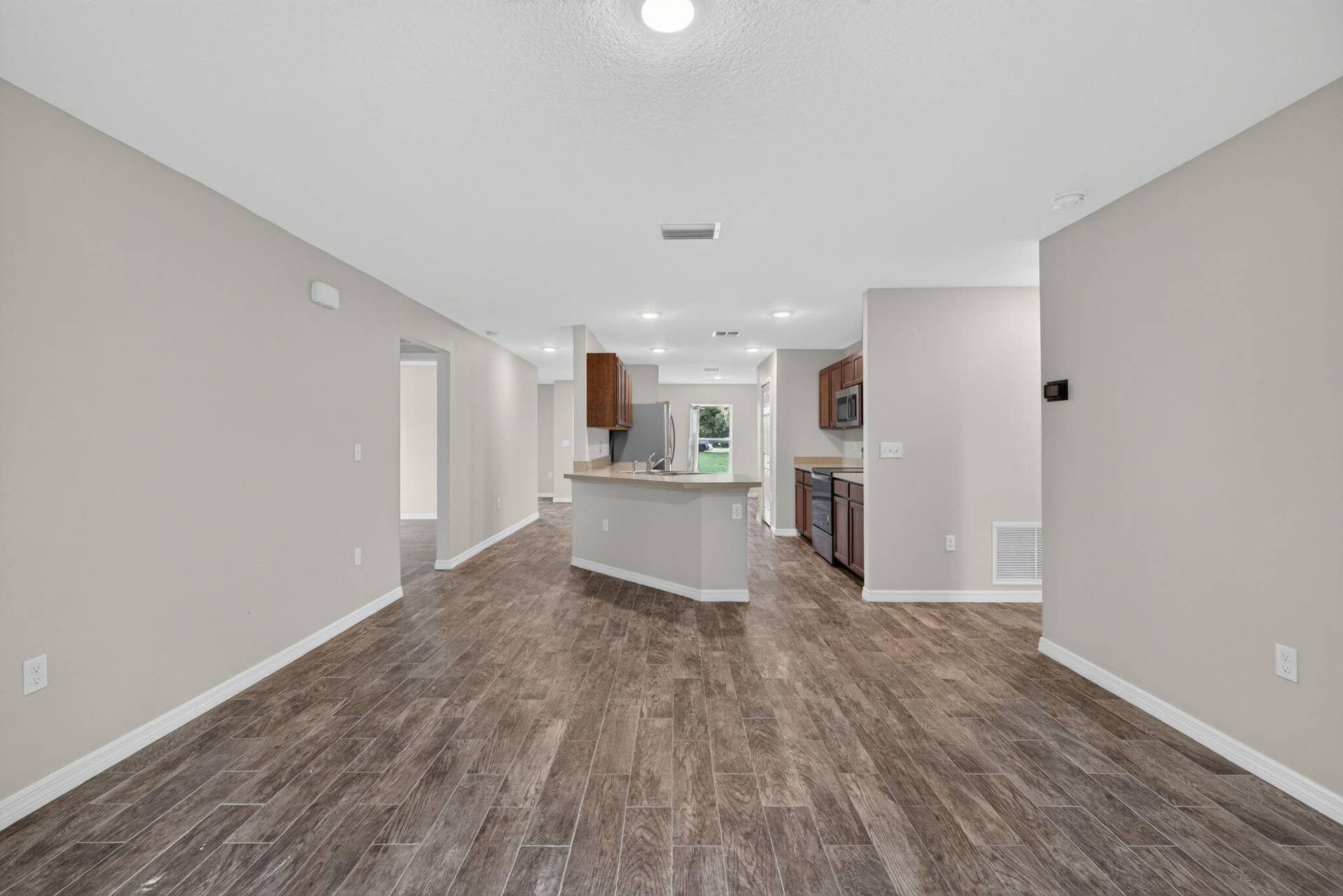 3918 SW BRUNSWICK Street, Port St Lucie, FL 34953 Living room / Kitchem
