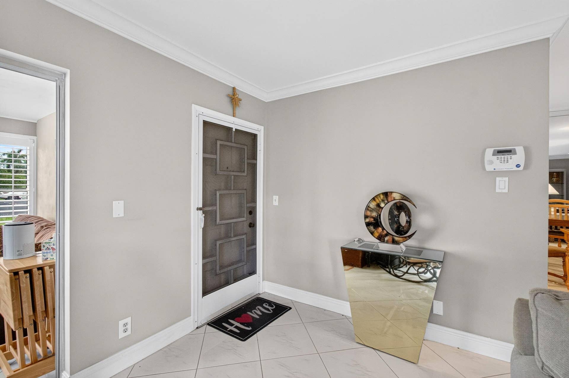 Entrance to villa interior view with scr