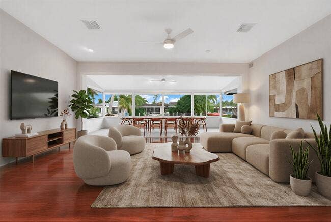 2142 NE 17th Avenue, Wilton Manors, FL 33305 Virtually staged. Wood-finish flooring, recessed lighting, and a ceiling fan